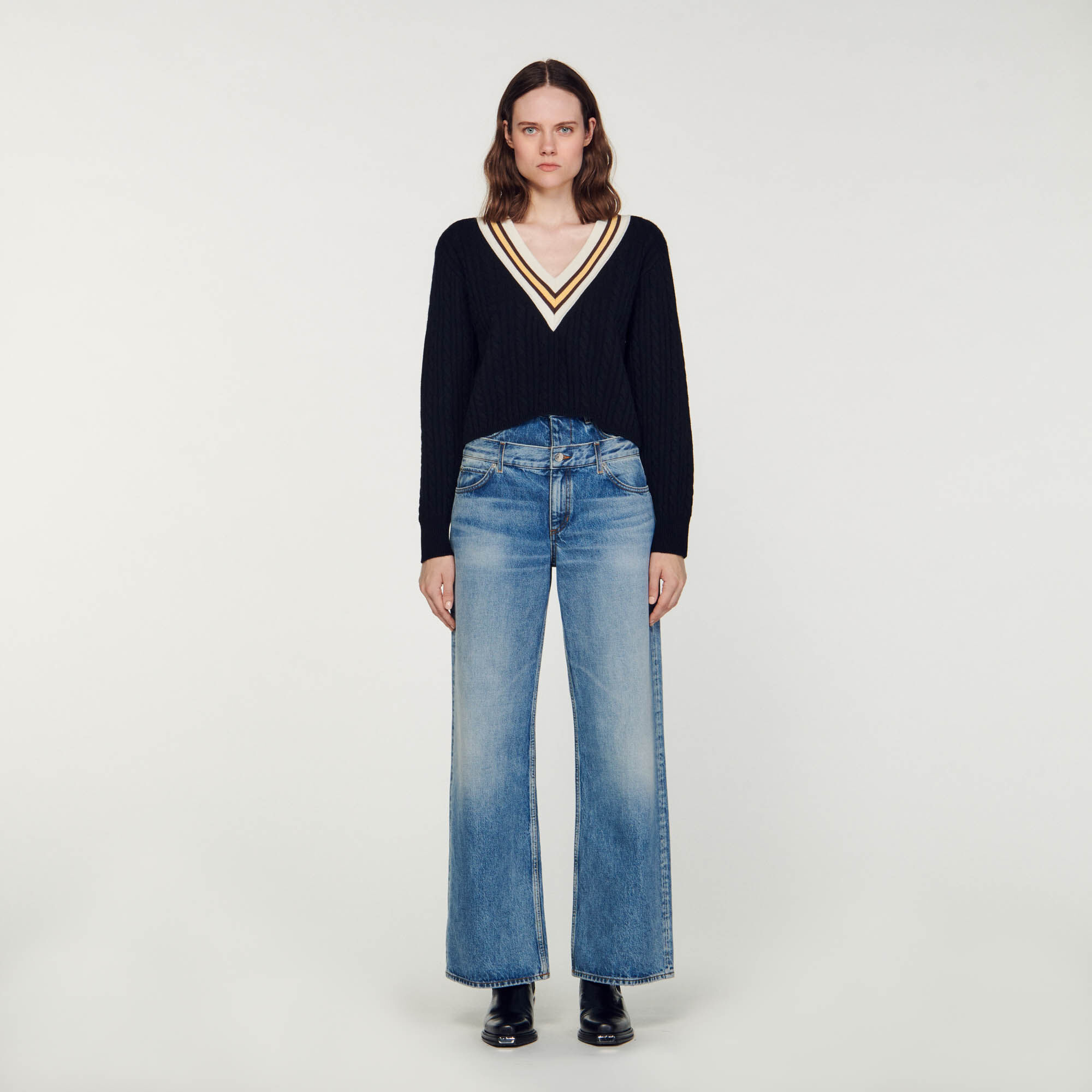 Sandro cardigan with contrasting store slogan