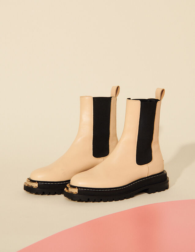 Sandro Ankle boots with notched sole. 1