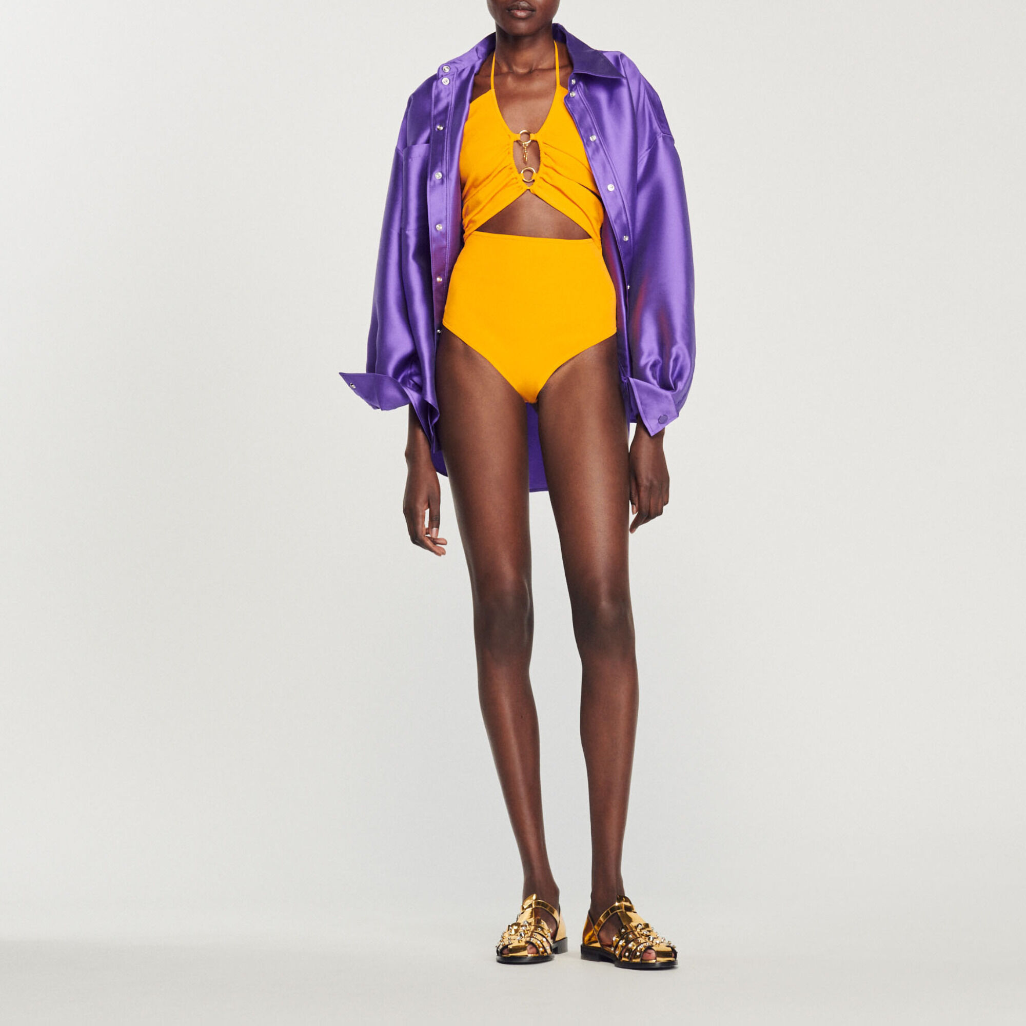 Sandro Knit bodysuit with ring details Select a size and