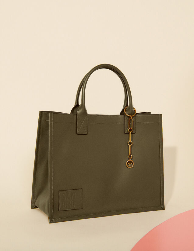 Sandro Leather tote bag with chain jewelry Login to add to Wish list. 1