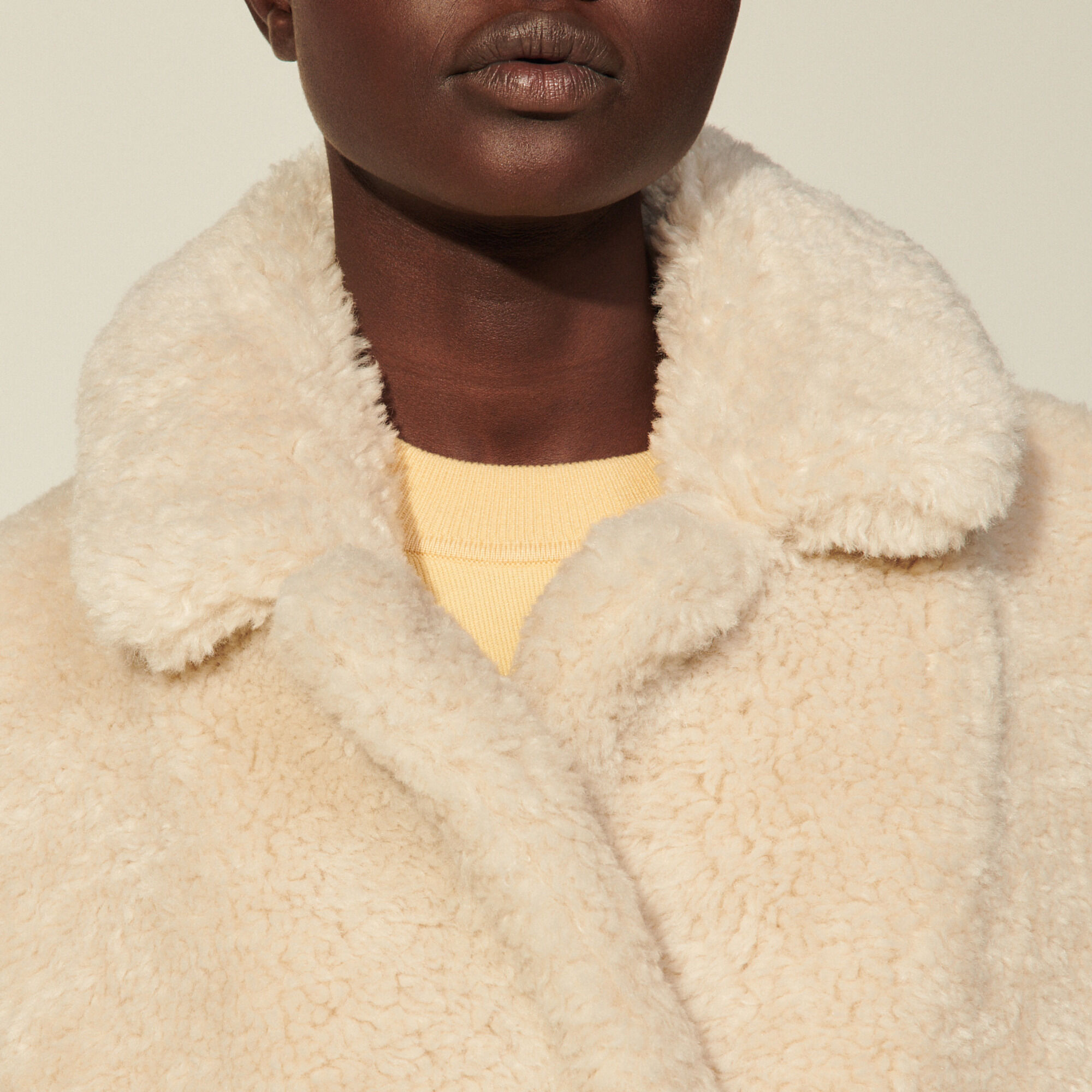sandro long faux fur coat