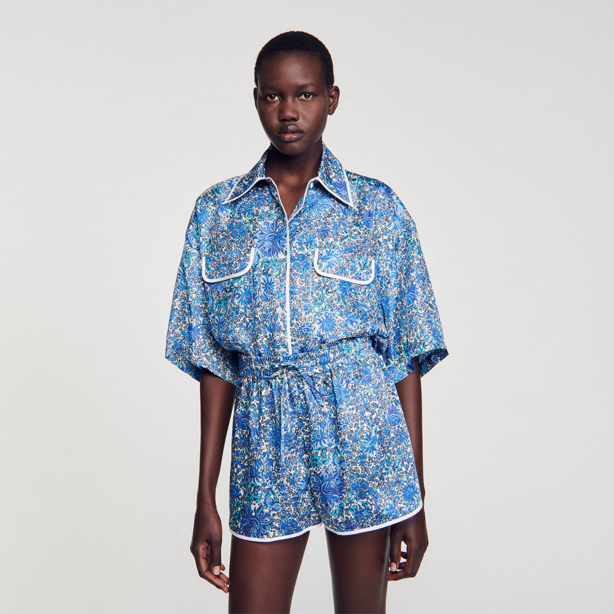 Blue and 2025 white patterned shorts