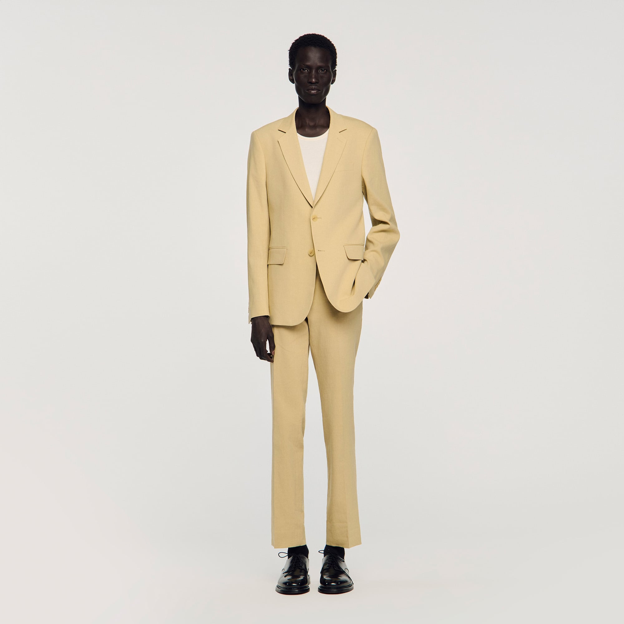 Sandro linen Classic-fit linen suit jacket featuring a lapel collar and a two-button front fastening