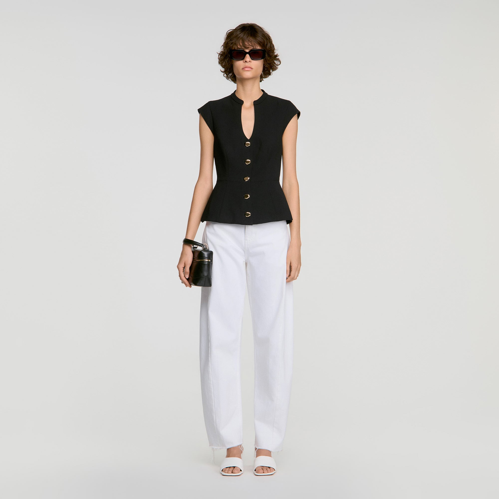 Buttoned peplum top