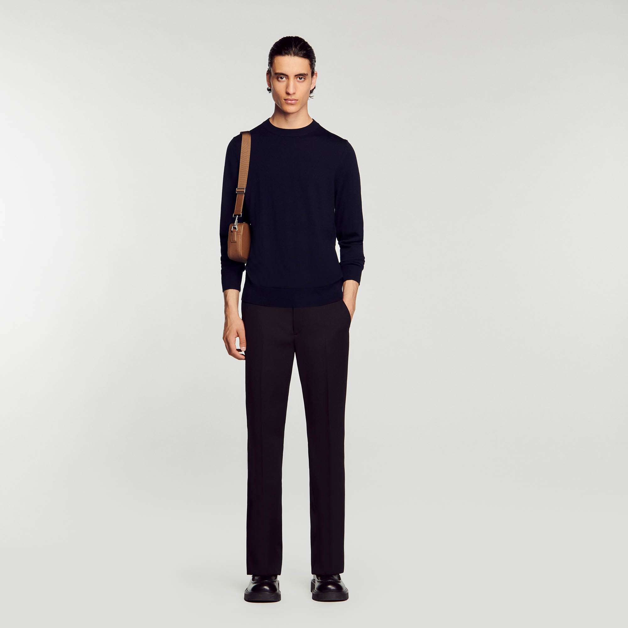 Sandro wool Rib: Knitted merino sweater with a round neck and long sleeves