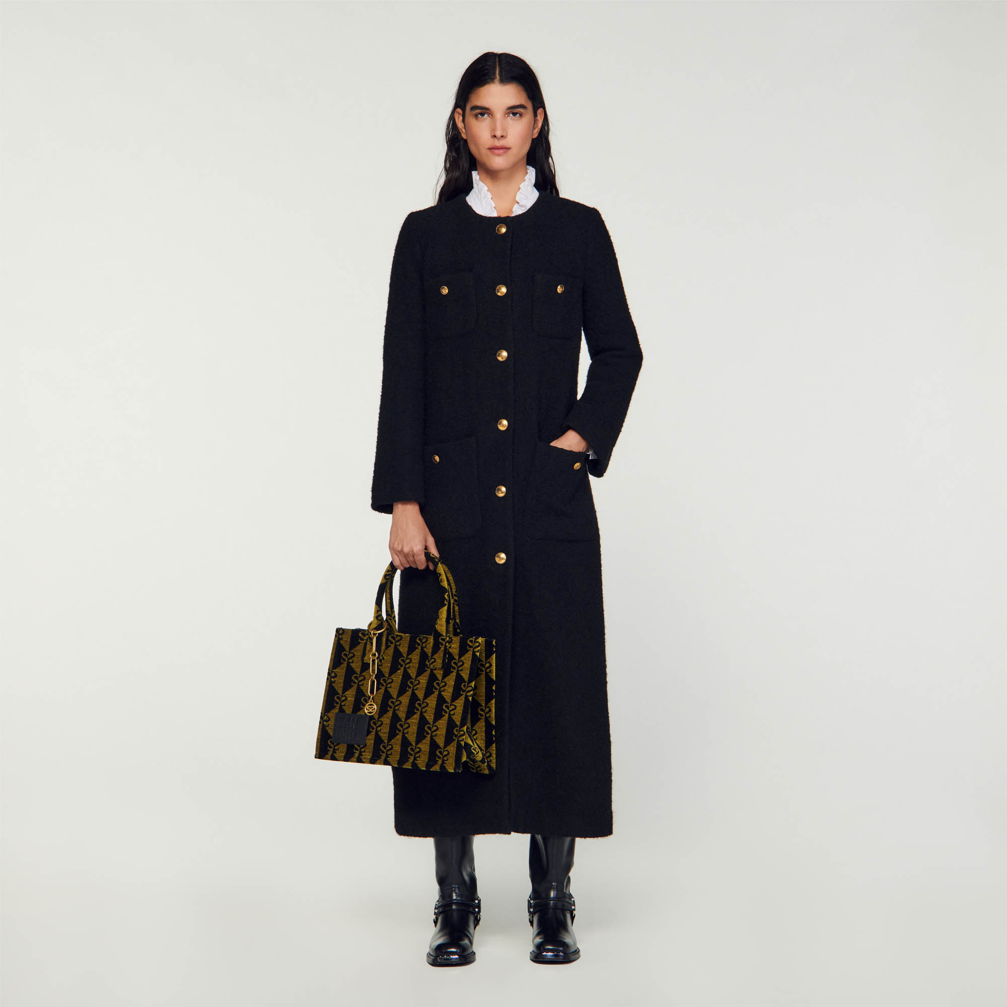 Sandro cotton Long coat in bouclé fabric with round neckline, patch pockets, long sleeves, fastened with gold-tone buttons