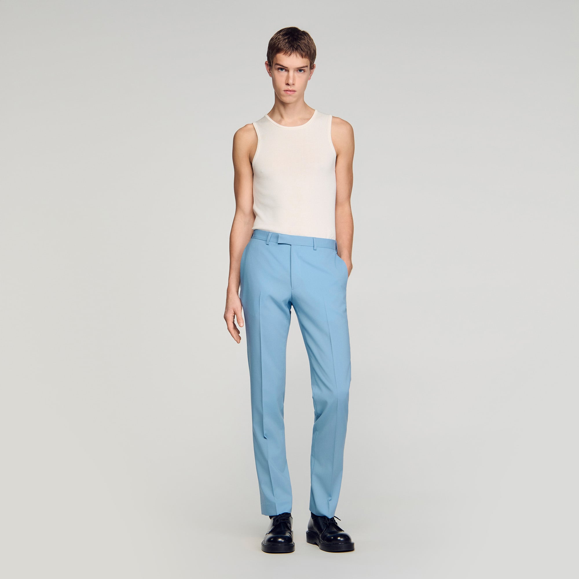Sandro virgin Classic-fit virgin wool suit trousers, featuring front pockets and piped back pockets