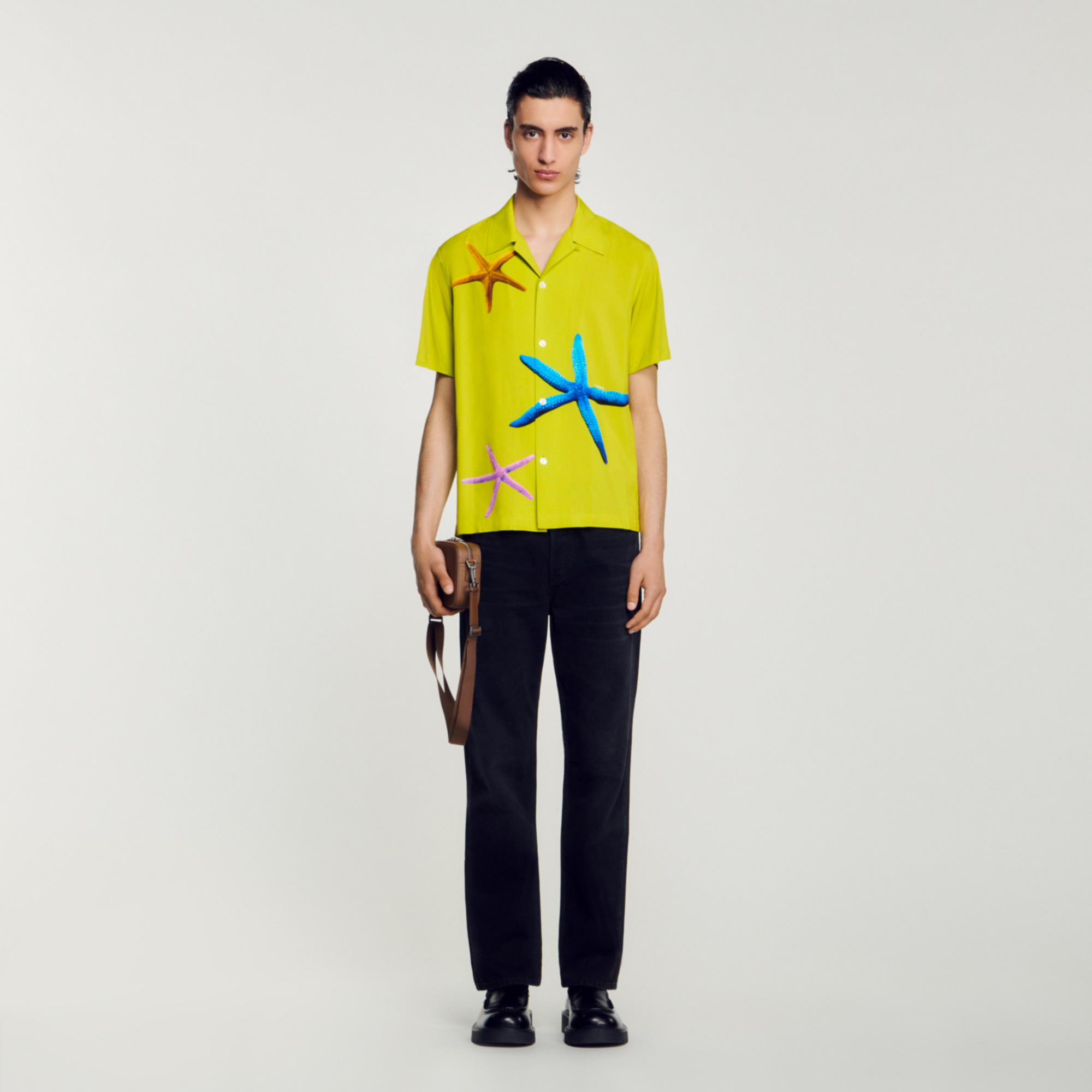 Sandro viscose Flowing shirt with a spread collar, short sleeves, a button fastening, and a starfish print