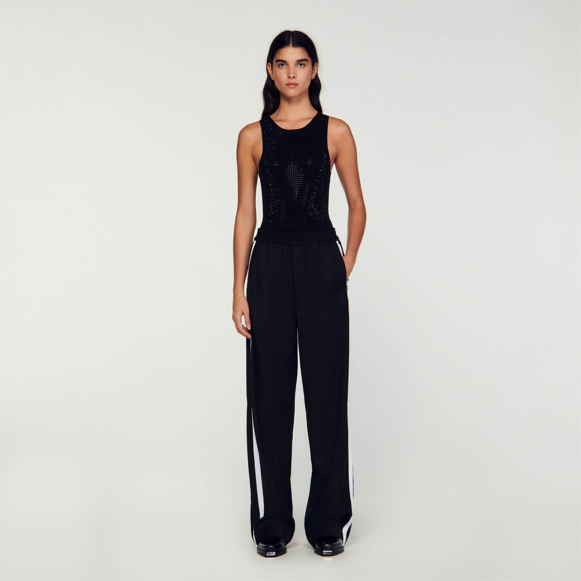 Sandro viscose Sleeveless knit bodysuit embellished with rhinestones featuring a round neck and a button placket