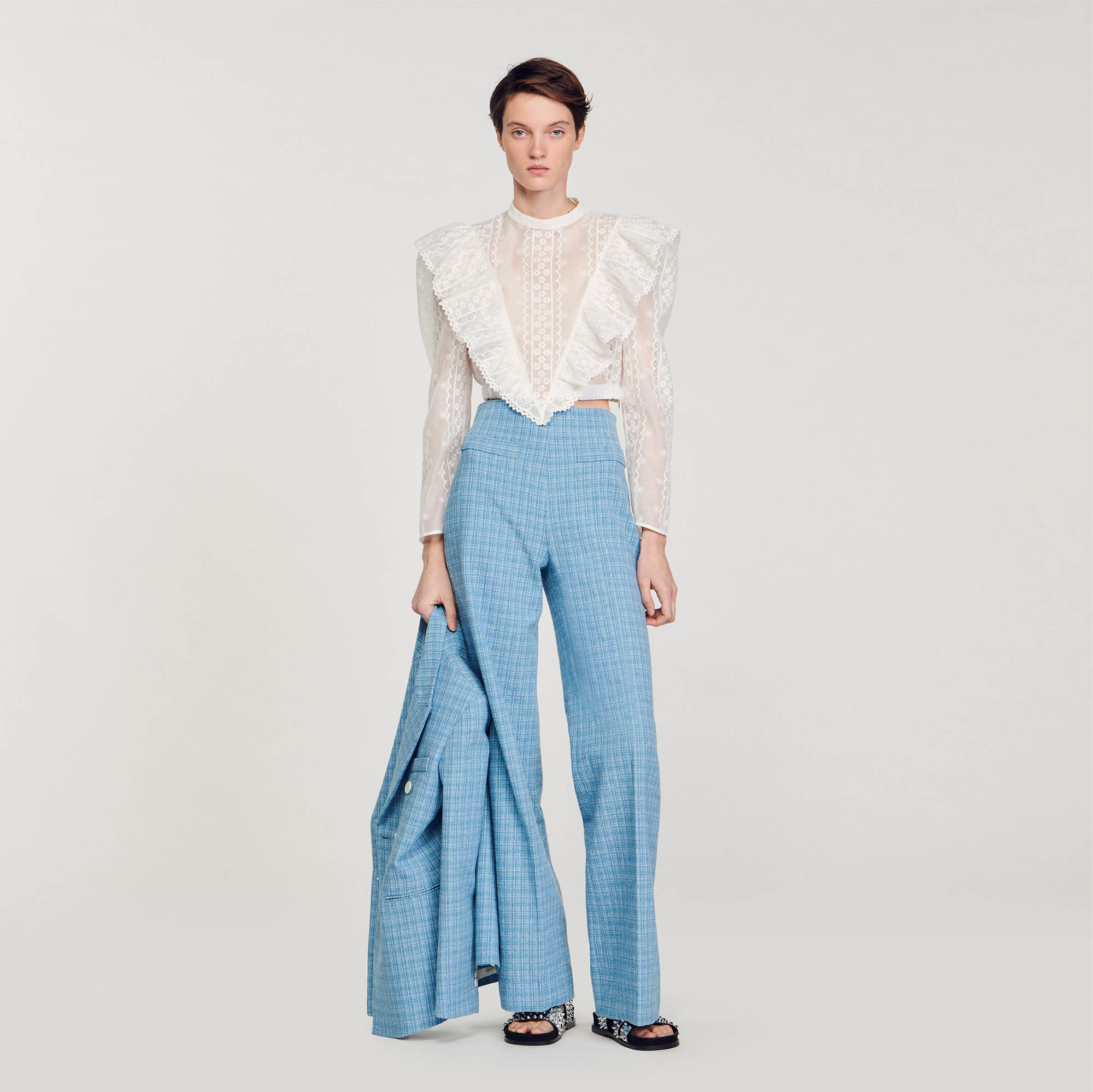 Sandro polyester Lining: Crop top in semi-sheer broderie anglaise with asymmetrical ruffles, featuring a round neck, long sleeves and a button fastening at the back