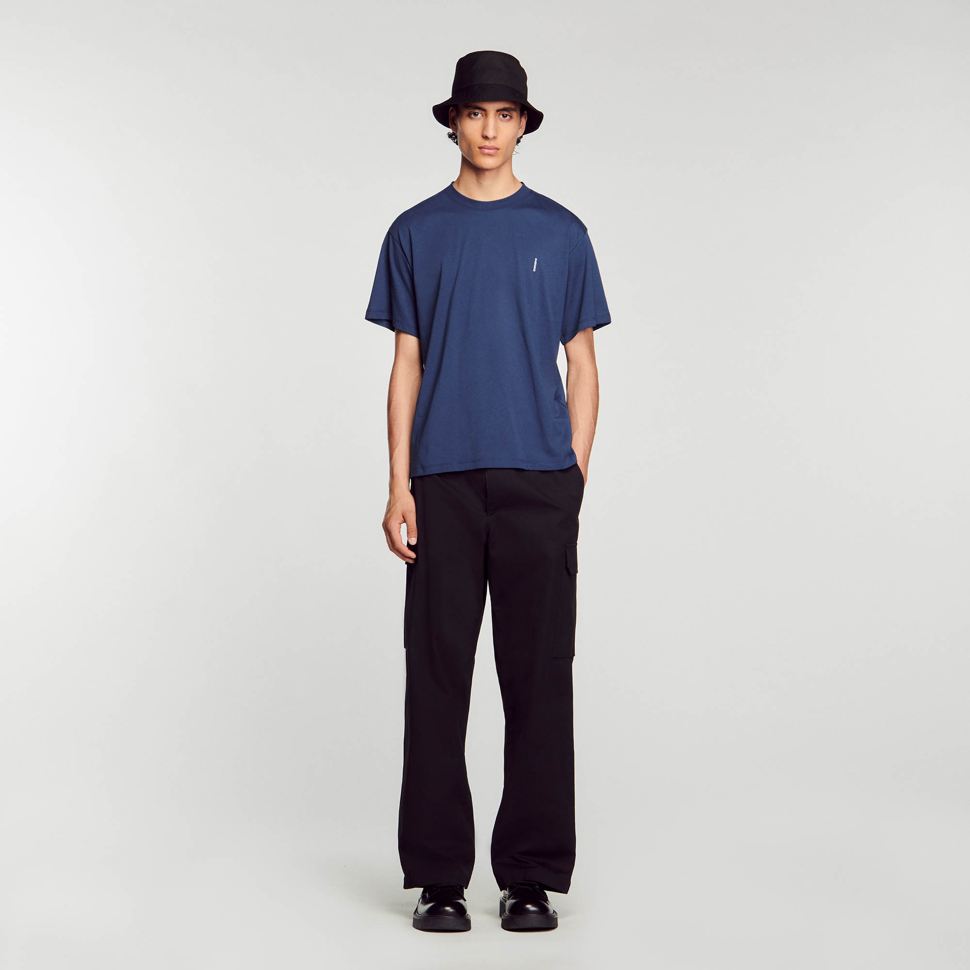 Sandro cotton Embroidery: Oversized cotton T-shirt with a round neck, short sleeves, and vertical Sandro embroidery