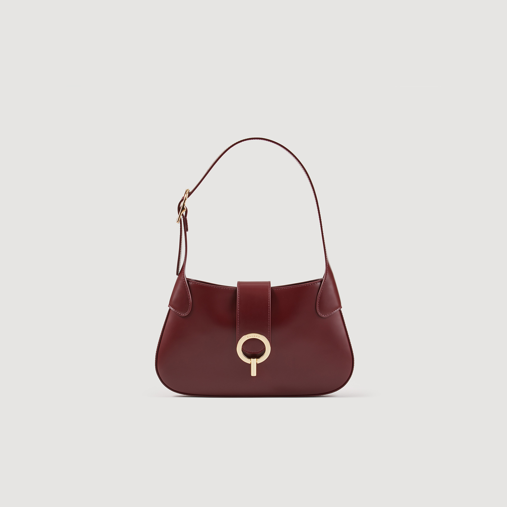Sandro cotton Leather: Smooth leather baguette shoulder bag with a signature clasp and a metal buckle handle