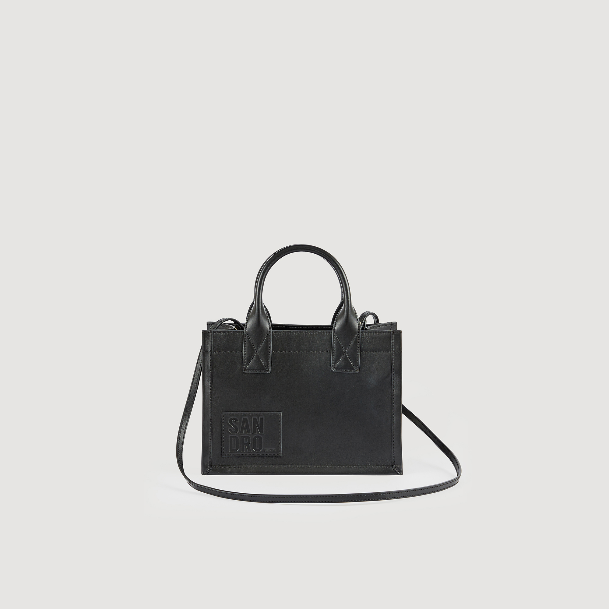 Sandro cotton Leather: Small smooth leather tote bag with a tone-on-tone embossed Sandro label, a magnetic fastening, small handles and an inner pouch