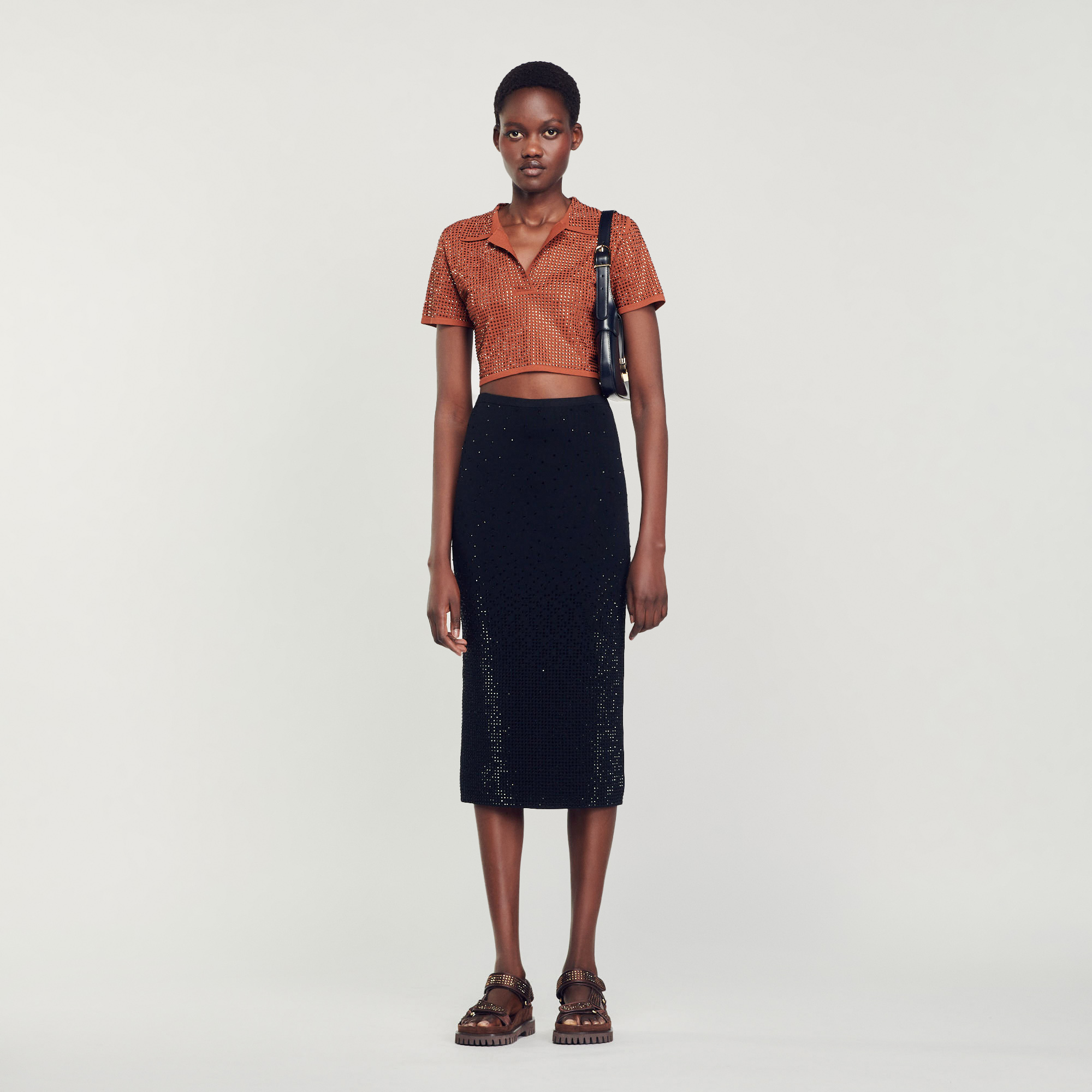 Sandro viscose Figure-hugging stretch-knit midi skirt, embellished with all-over rhinestones