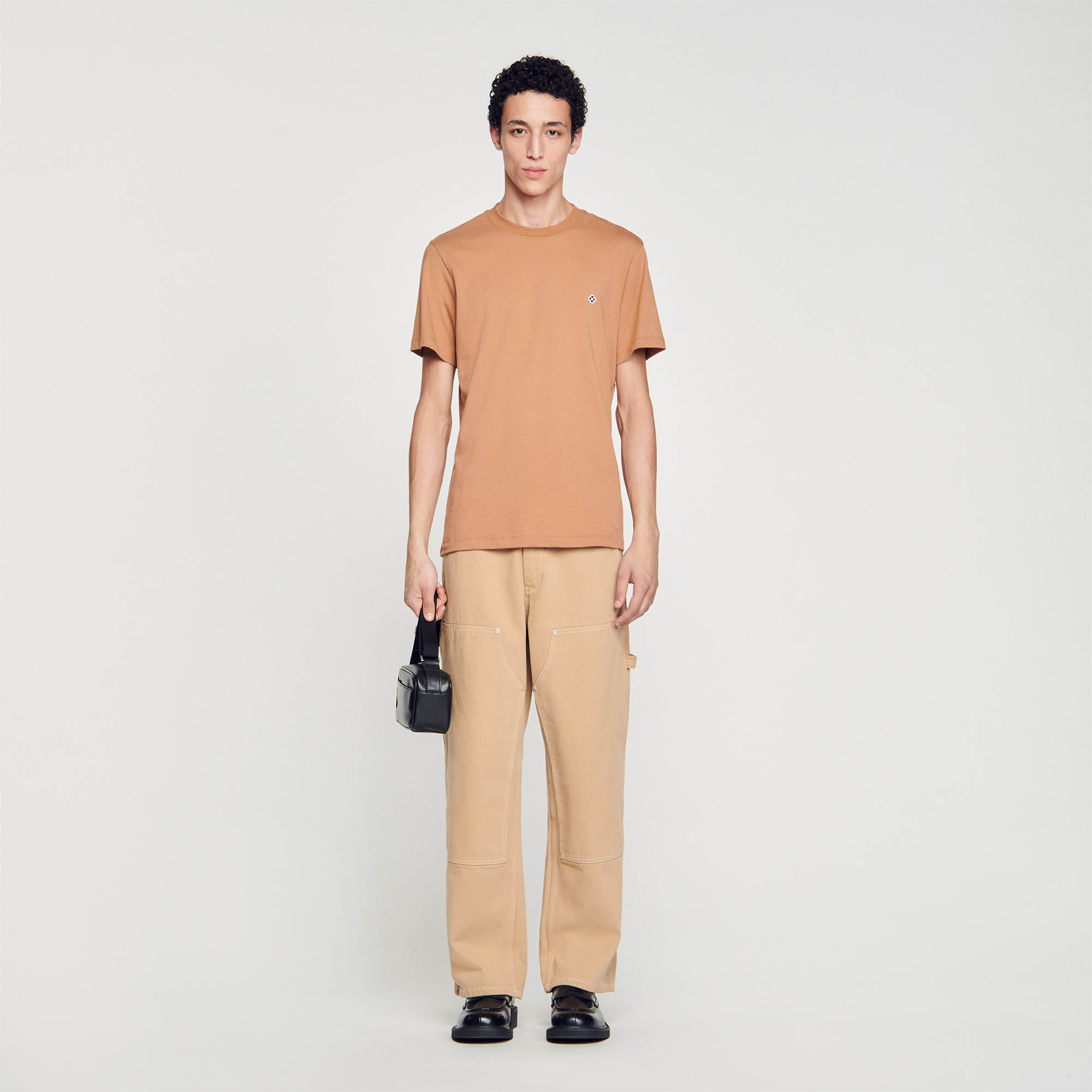 Sandro cotton Patch: Cotton T-shirt with a round neck, short sleeves and a mini Square Cross patch on the chest