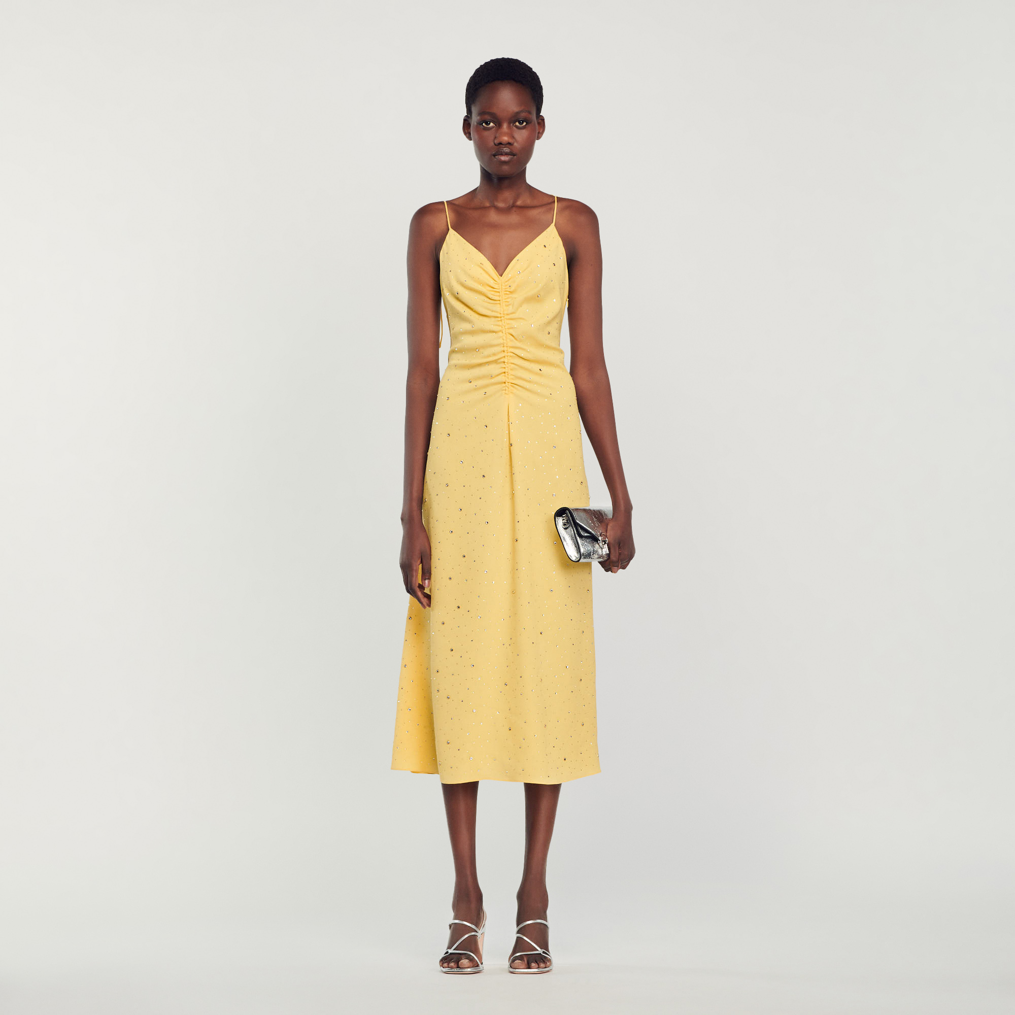 Sandro polyester Diamante: Long dress with a flared skirt, thin crossover straps tied at the back, a gathered plunging neckline, and all-over rhinestones