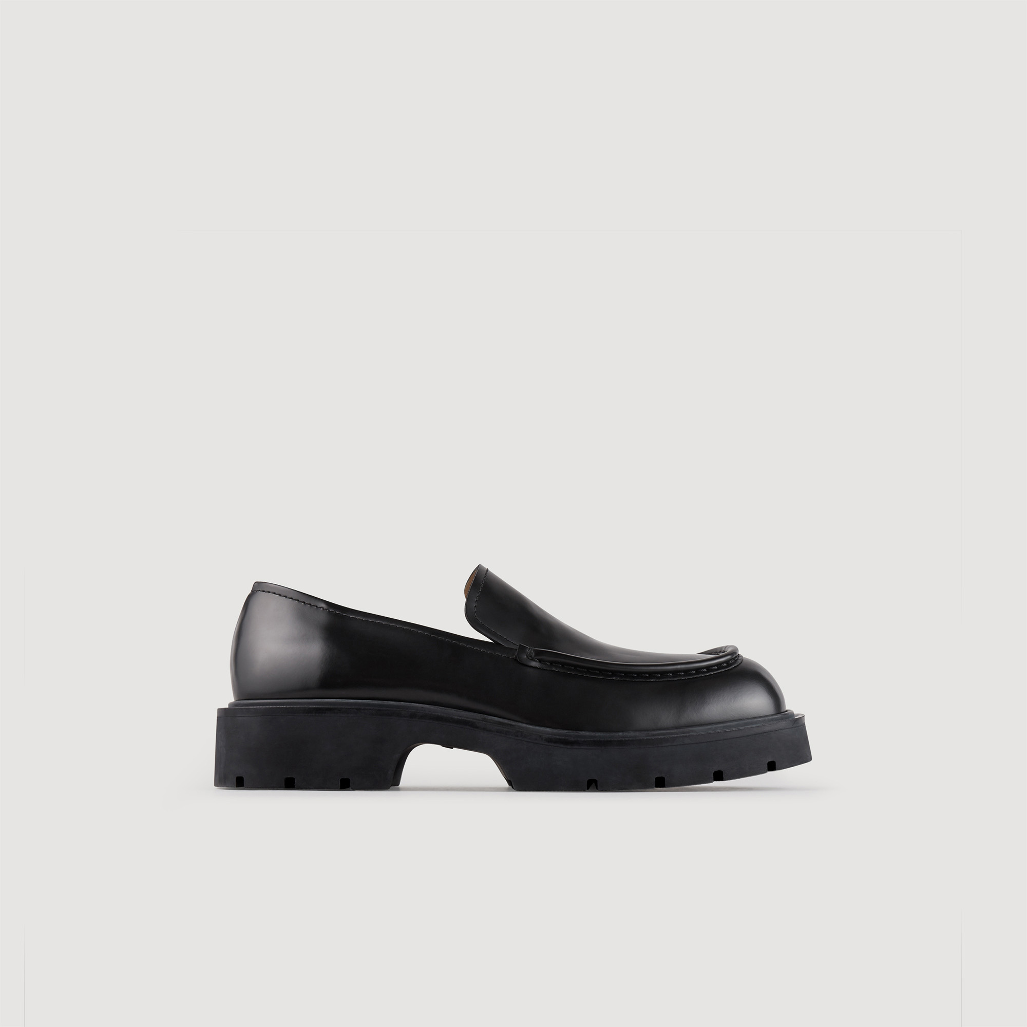 Sandro rubber Leather: Patent leather loafers with a chunky toe, a plain vamp with hand-stitched platform and a thick, one-piece sole with tread in an exclusive Sandro design