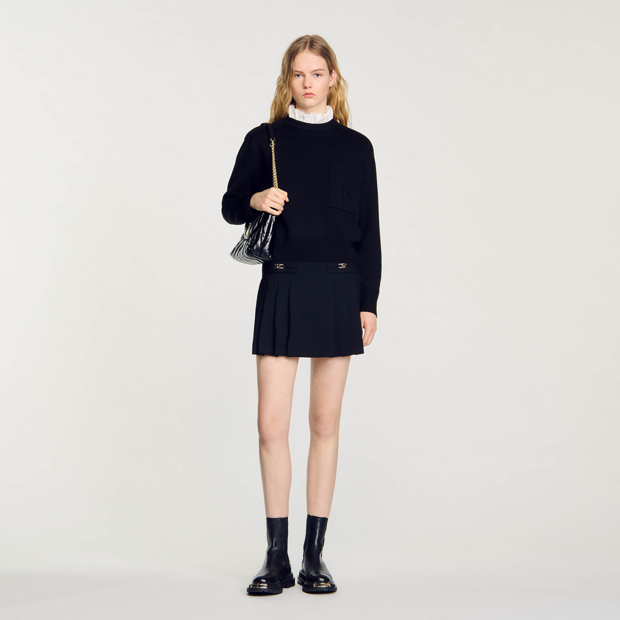 Sandro acrylic Double-sided knit sweater featuring a contrasting high neck with ruffles, long sleeves and a patch pocket on the chest embellished with velvet double-S embroidery