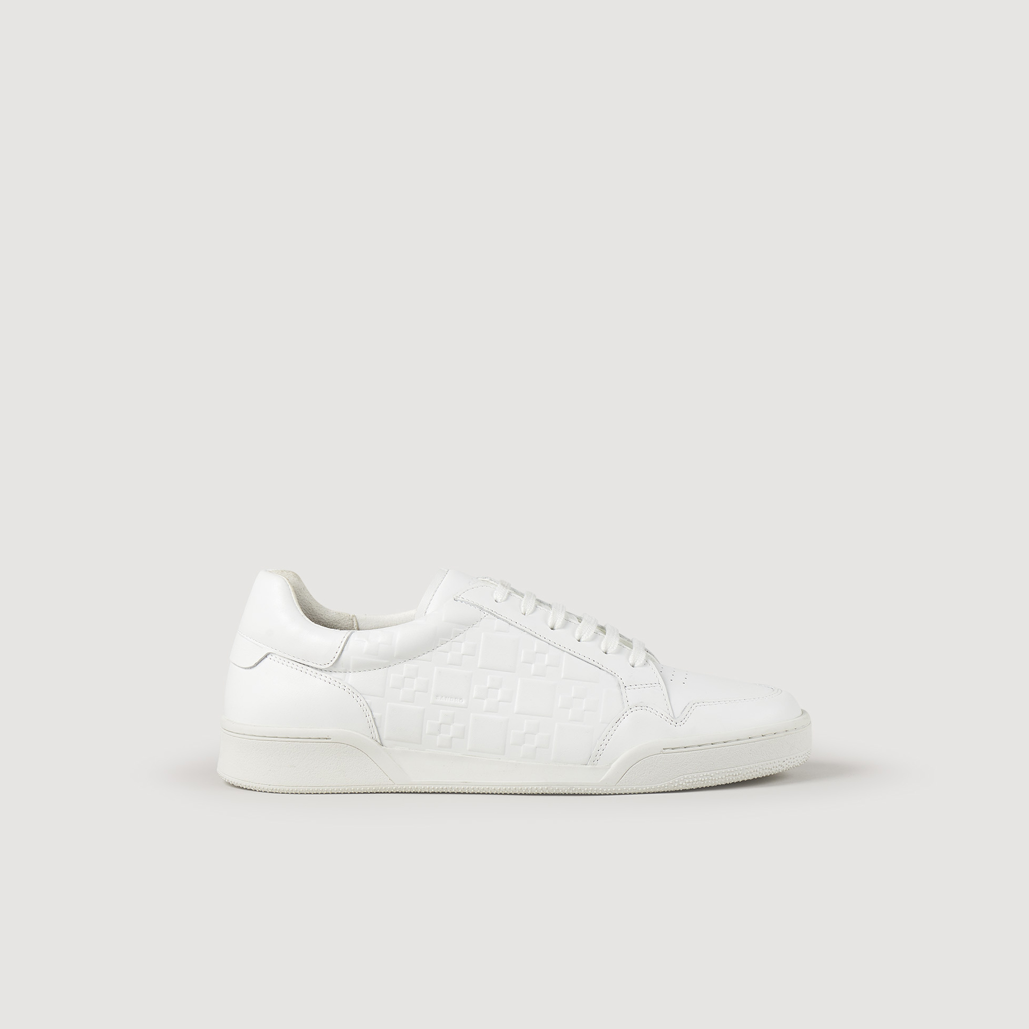 Sandro rubber Embossed leather sneakers with a signature square cross motif, a lace-up fastening, and a front tongue