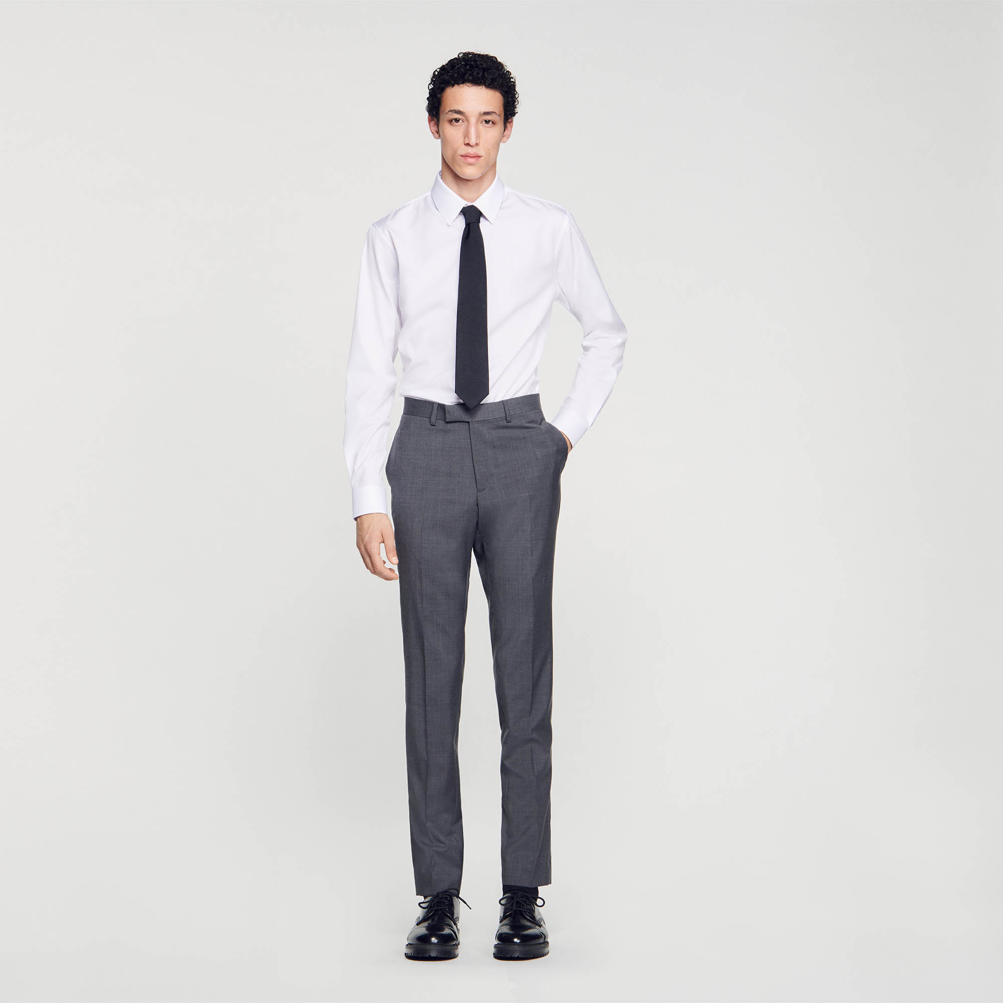 Sandro virgin wool Belt lining: Classic wool suit trousers with two side pockets and two back pockets