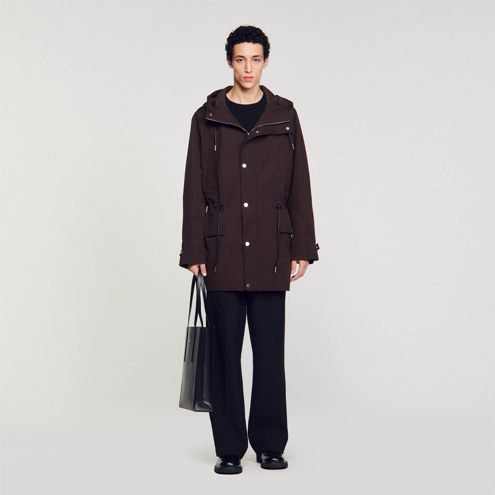 Sandro cotton Body lining: Cotton parka with long sleeves, press stud zip fastening, drawstring hood, chest pockets and flap pockets, embellished with a leather jacron