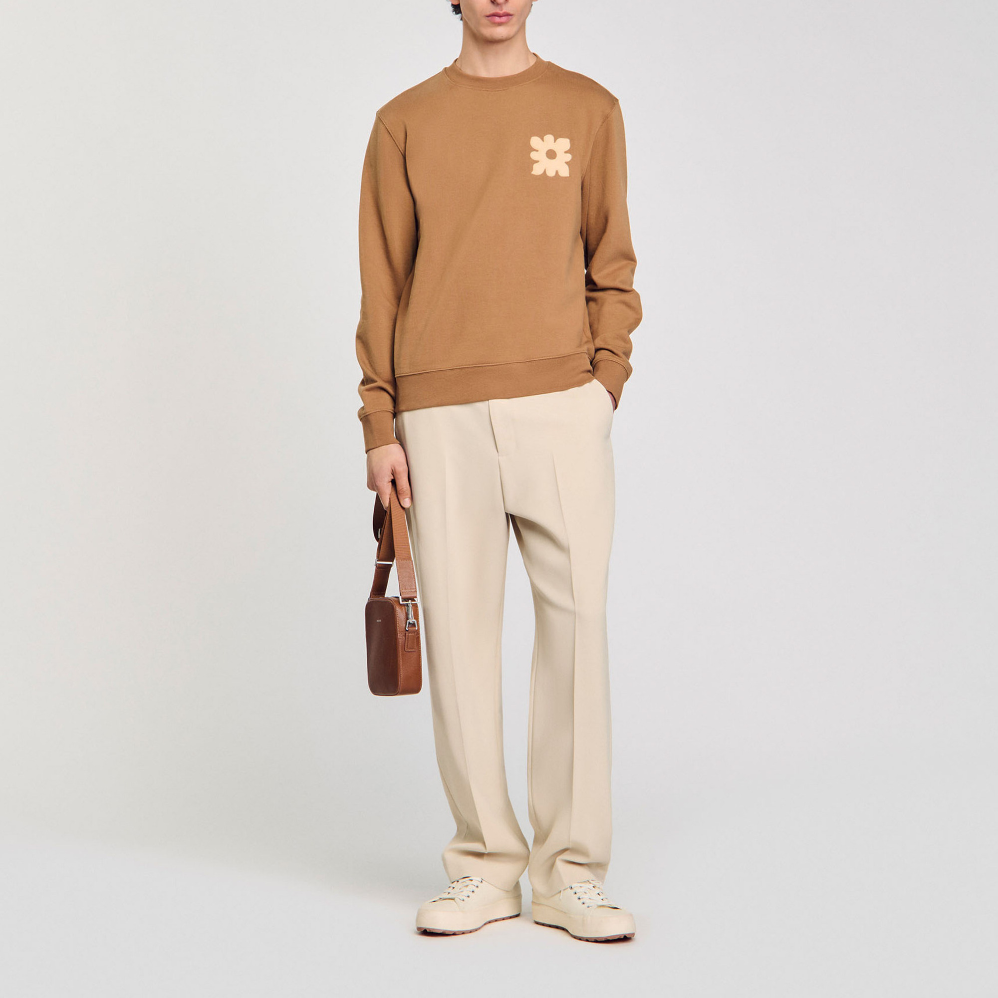 Sandro cotton Classic-fit brushed fleece sweatshirt with a round neck and long sleeves and a flower patch on the front