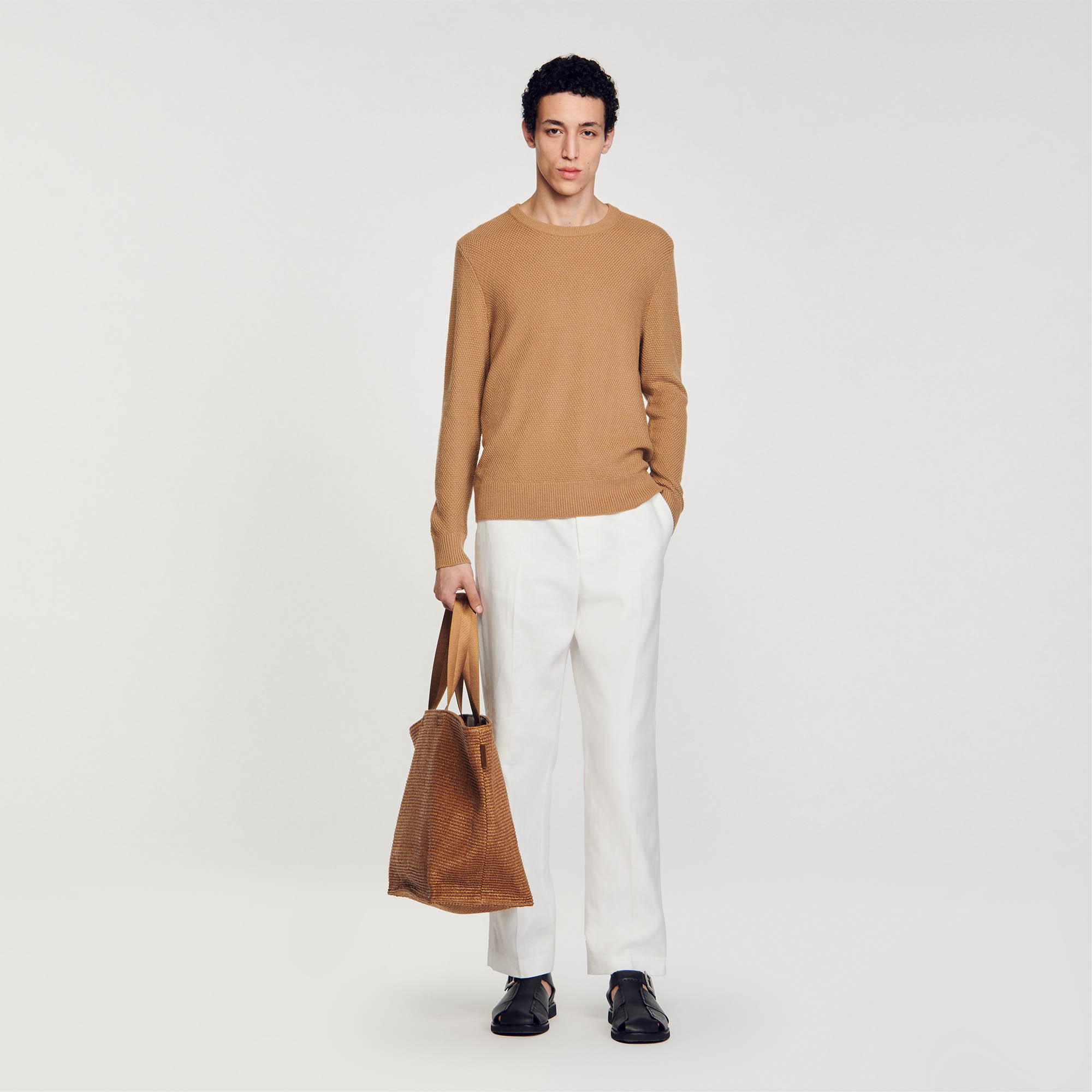 Sandro wool Sandro men's sweater â€¢ Fancy stitch knitted sweater â€¢ Rounded neckline â€¢ Ribbed trim finish â€¢ Long sleeves â€¢ The model is wearing a size S Sandro is committed to ever more responsible fashion