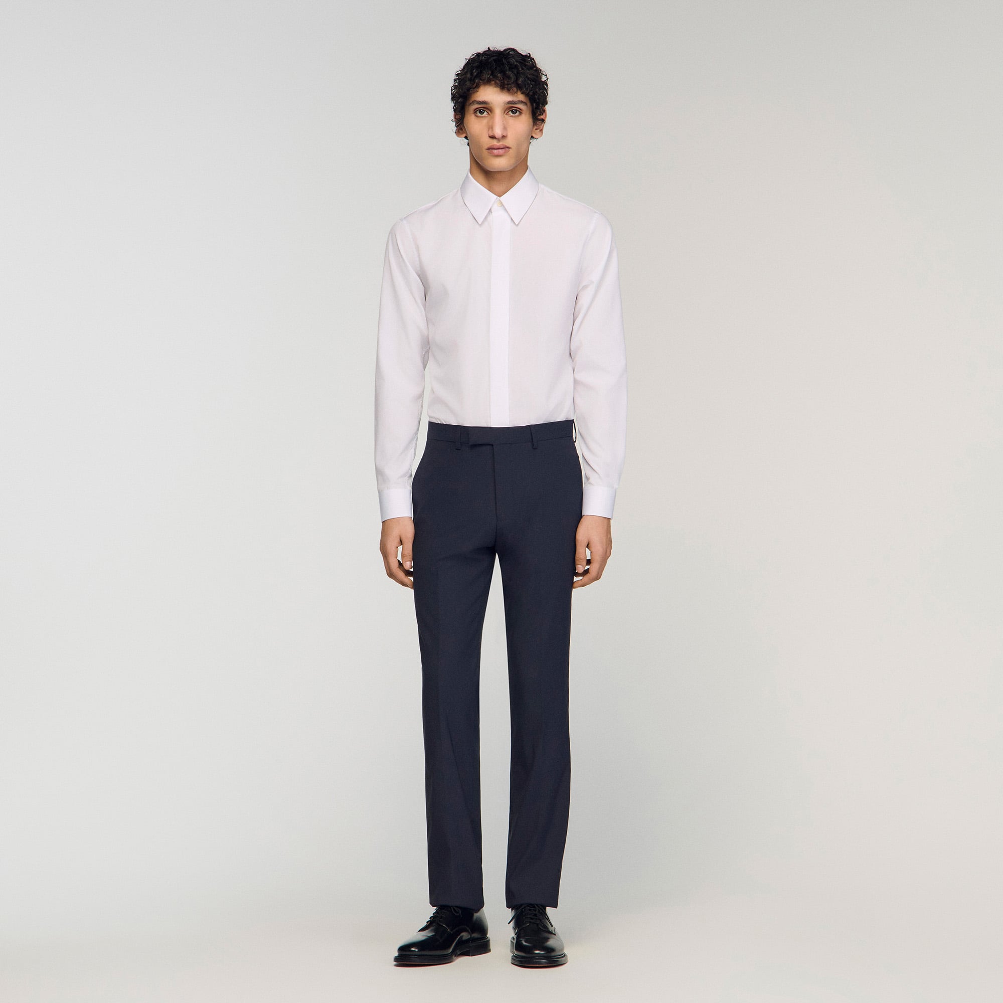 Sandro cotton Cotton shirt featuring a classic collar, long sleeves with buttoned cuffs and a covered button placket