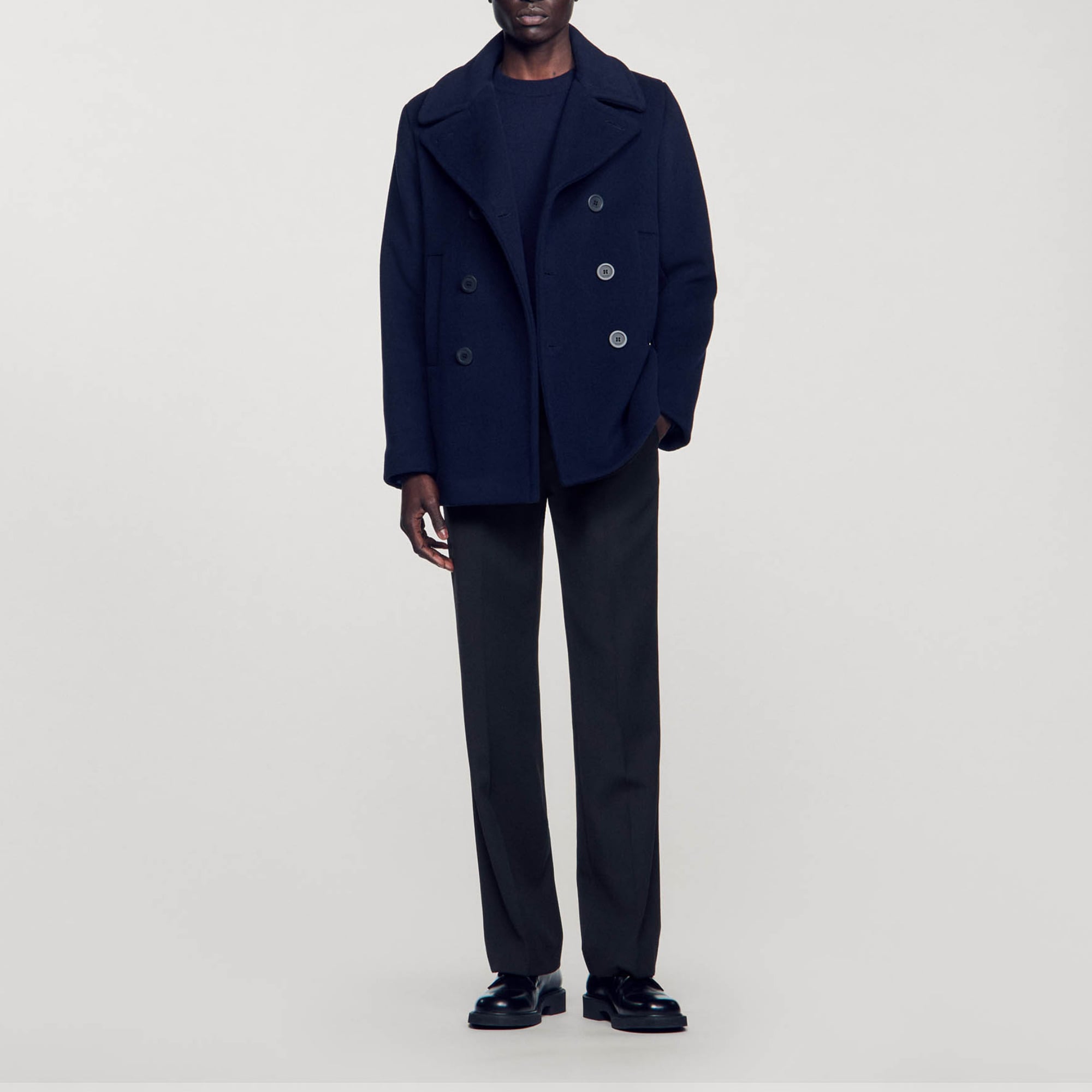 Sandro wool Wool pea coat with double-breasted buttoned design, long sleeves, lapel collar, and welt pockets