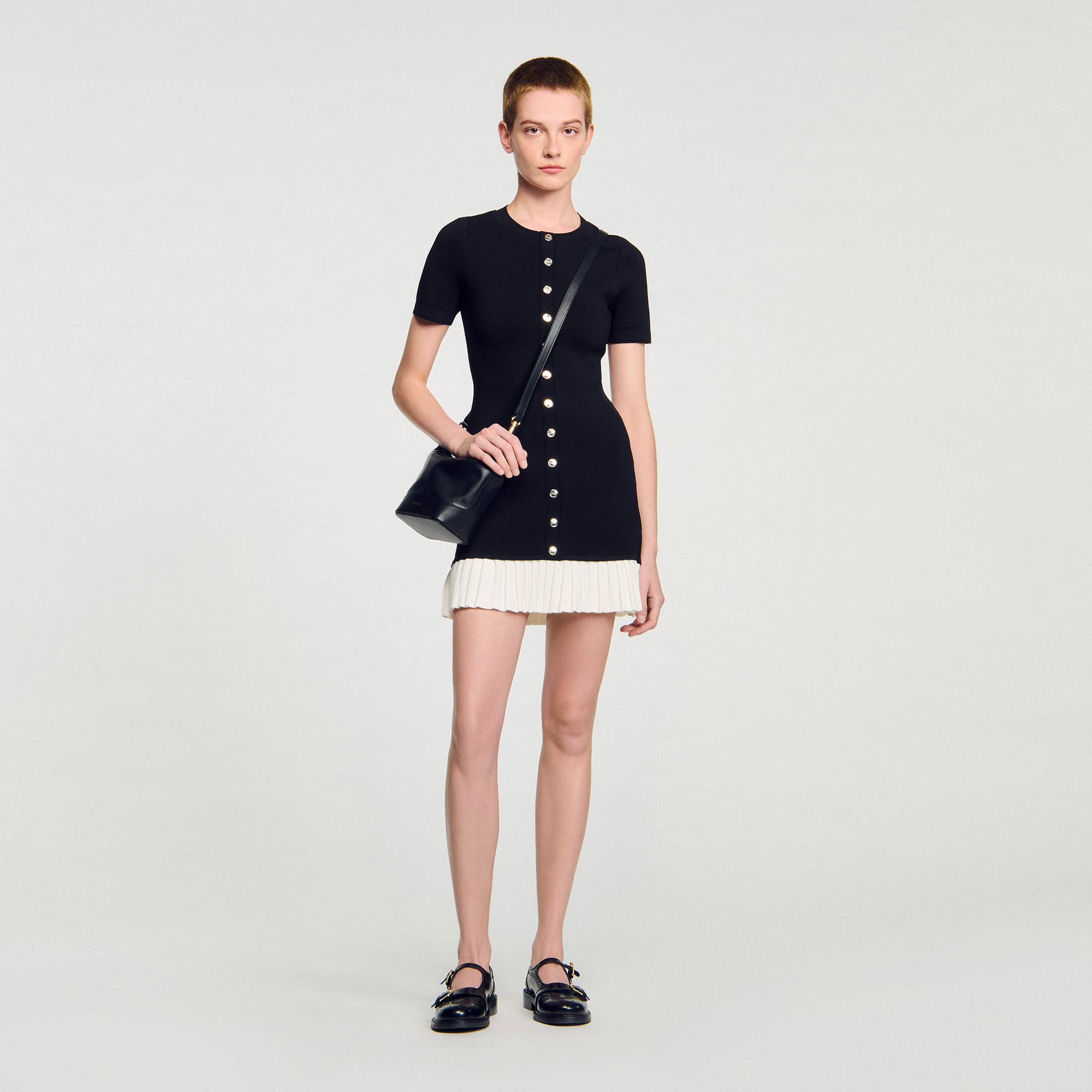 Mini knit dress with ruffle