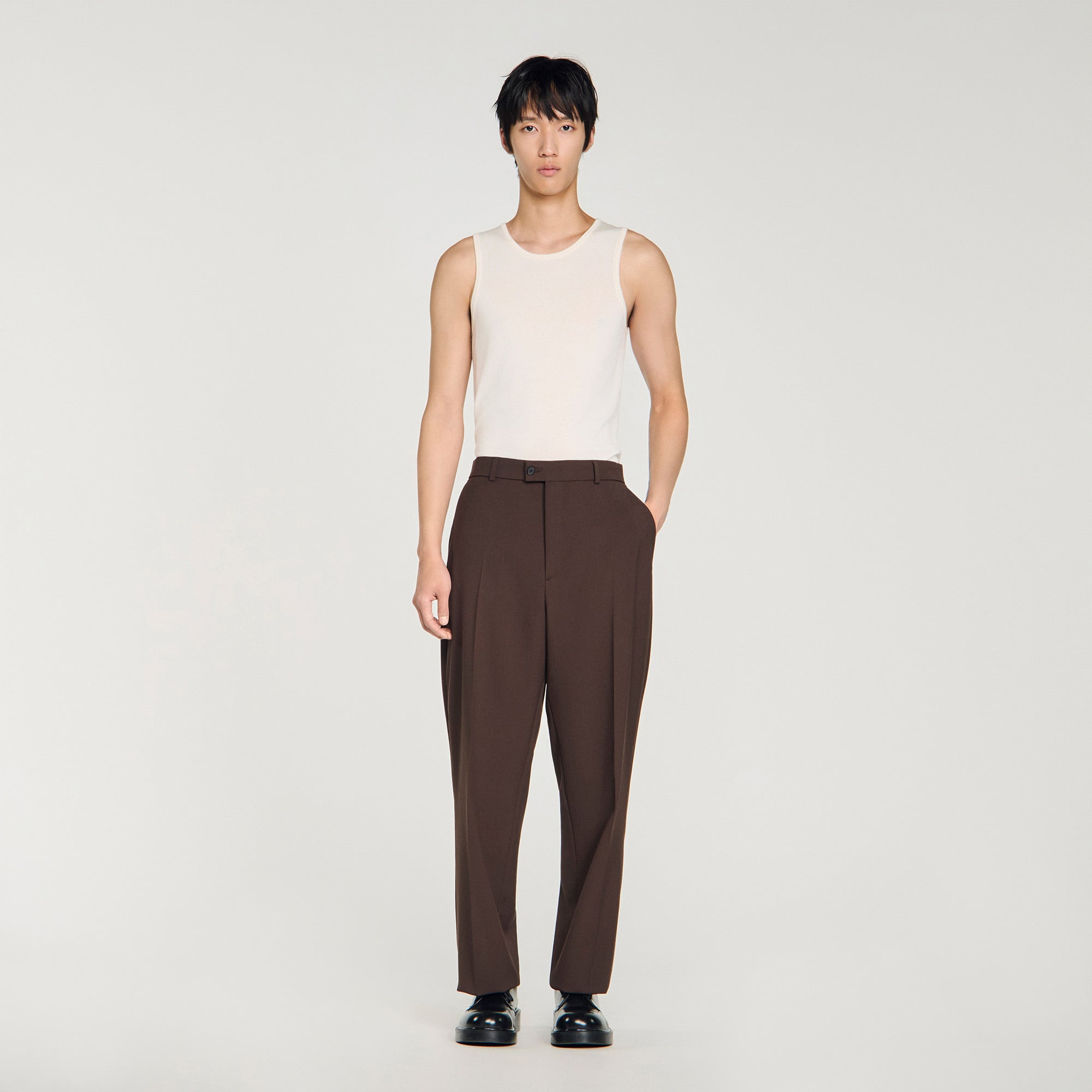 Sandro virgin Oversized virgin wool suit trousers with pockets and a front zip fastening