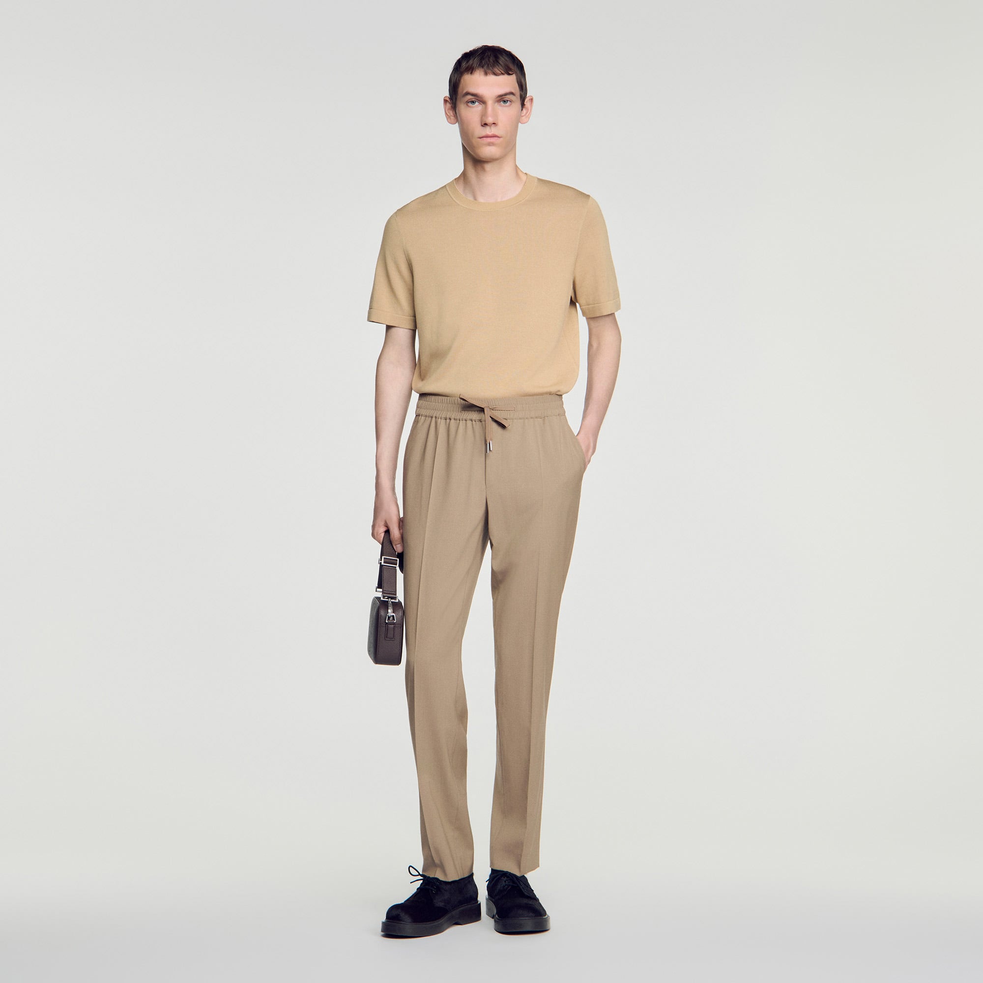Elasticated wool trousers