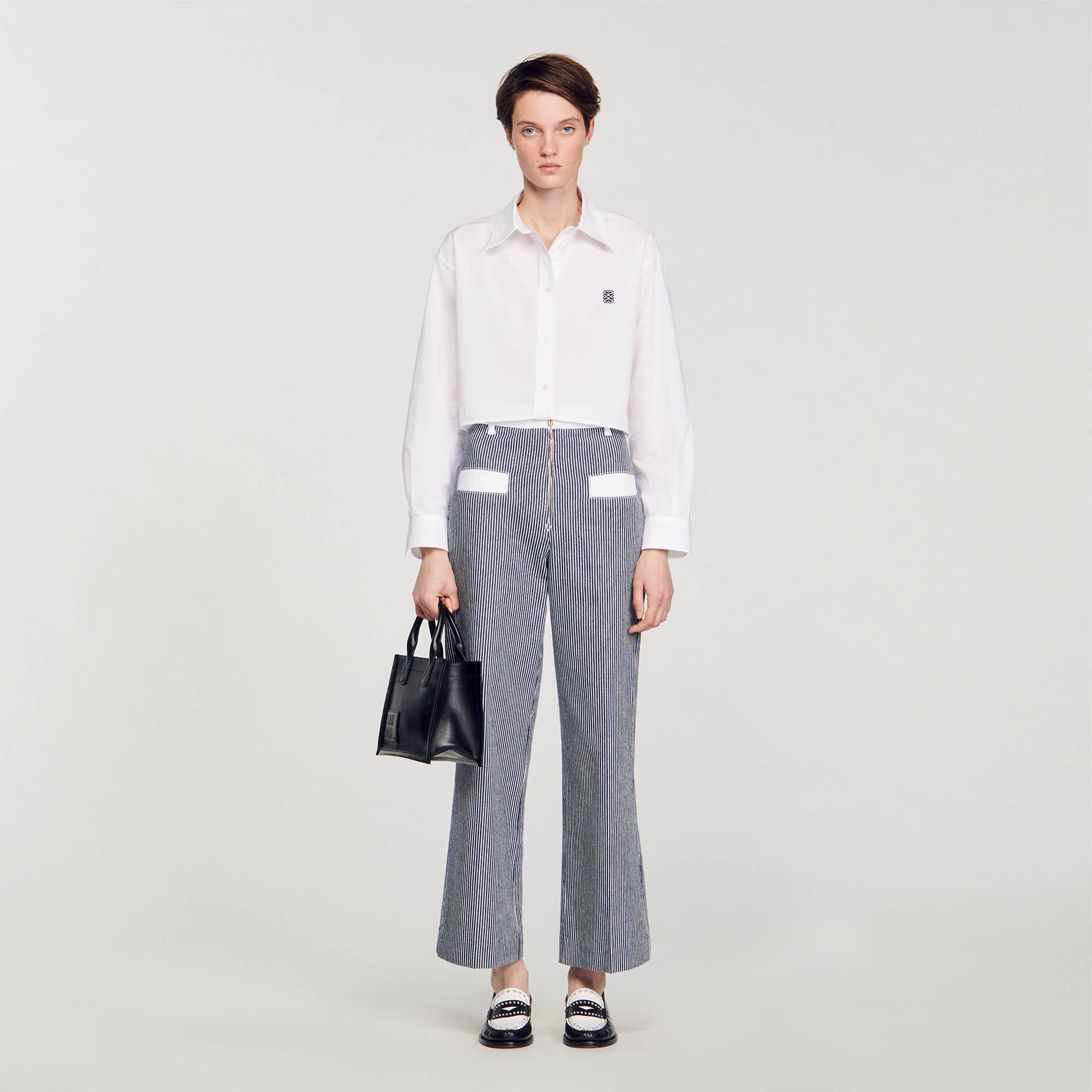 Sandro cotton Lining: The cotton in this item was produced organically via a cultivation method that preserves biodiversity and bans the use of pesticides and GMOs