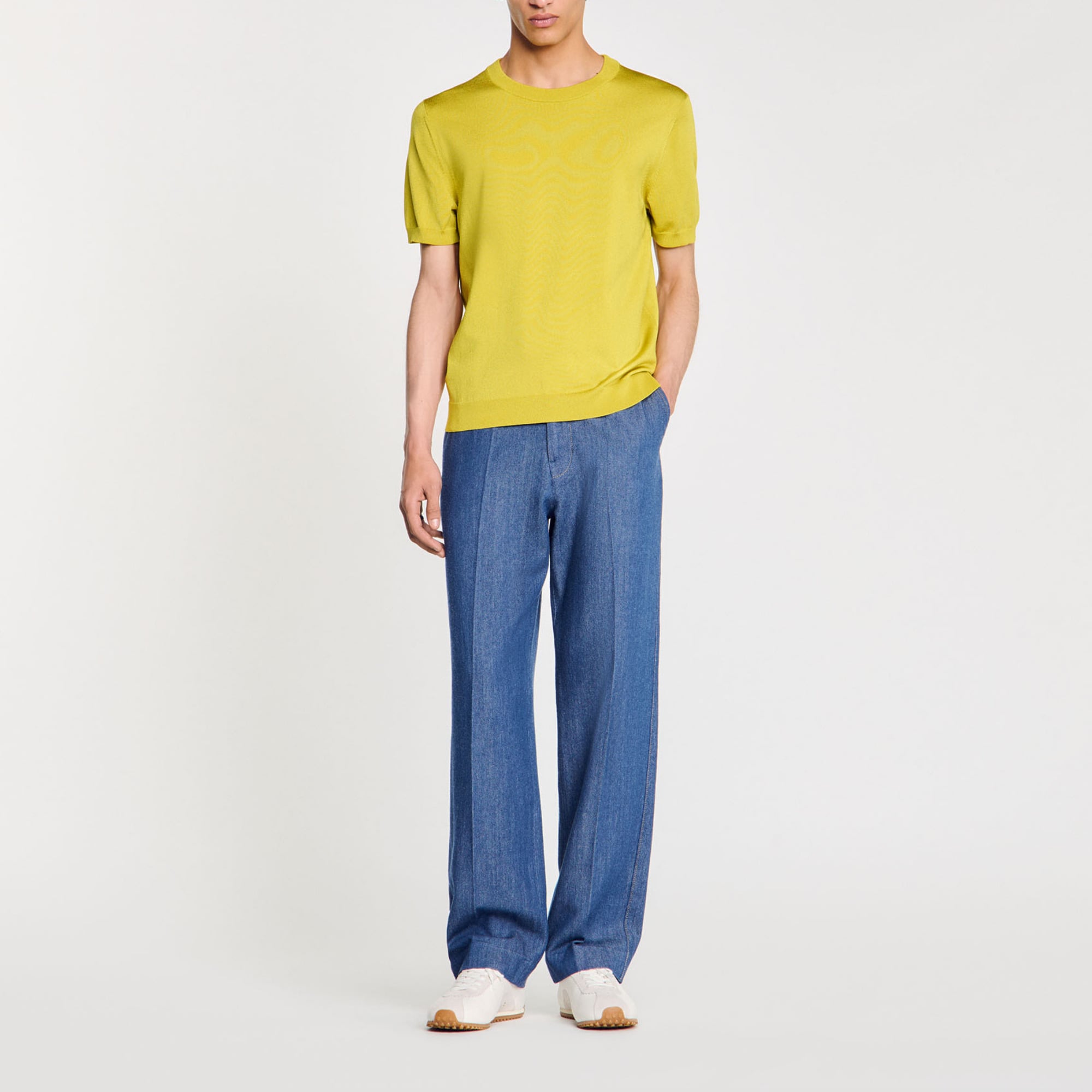 Sandro acetate Sandro Men's Knitted T-shirt Knitted T-shirt â€¢ Rounded neckline â€¢ Short sleeves Regular fit True to size The viscose in this item is made of cellulose from sustainably managed forests