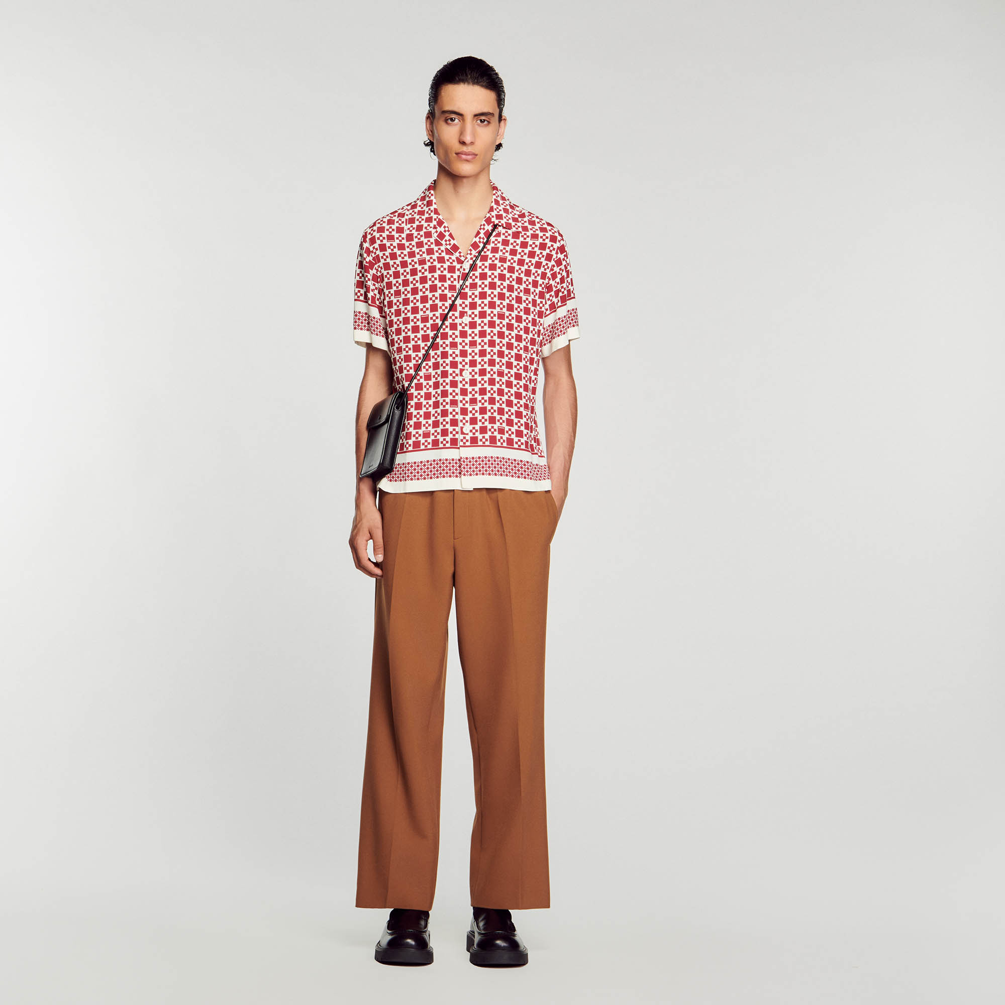 Sandro viscose Flowing button-down shirt with short sleeves, a shark collar, a Square Cross print, and a contrasting stripe on the bottom