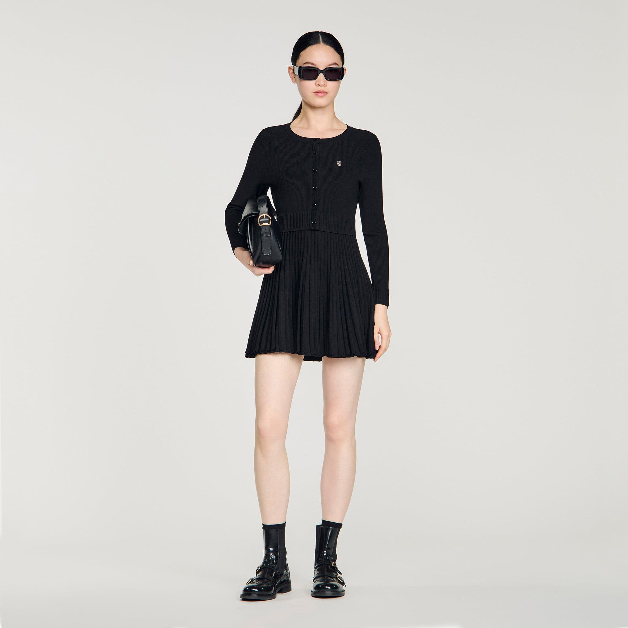 Pleated knit mini dress in Black for Women | Sandro Paris