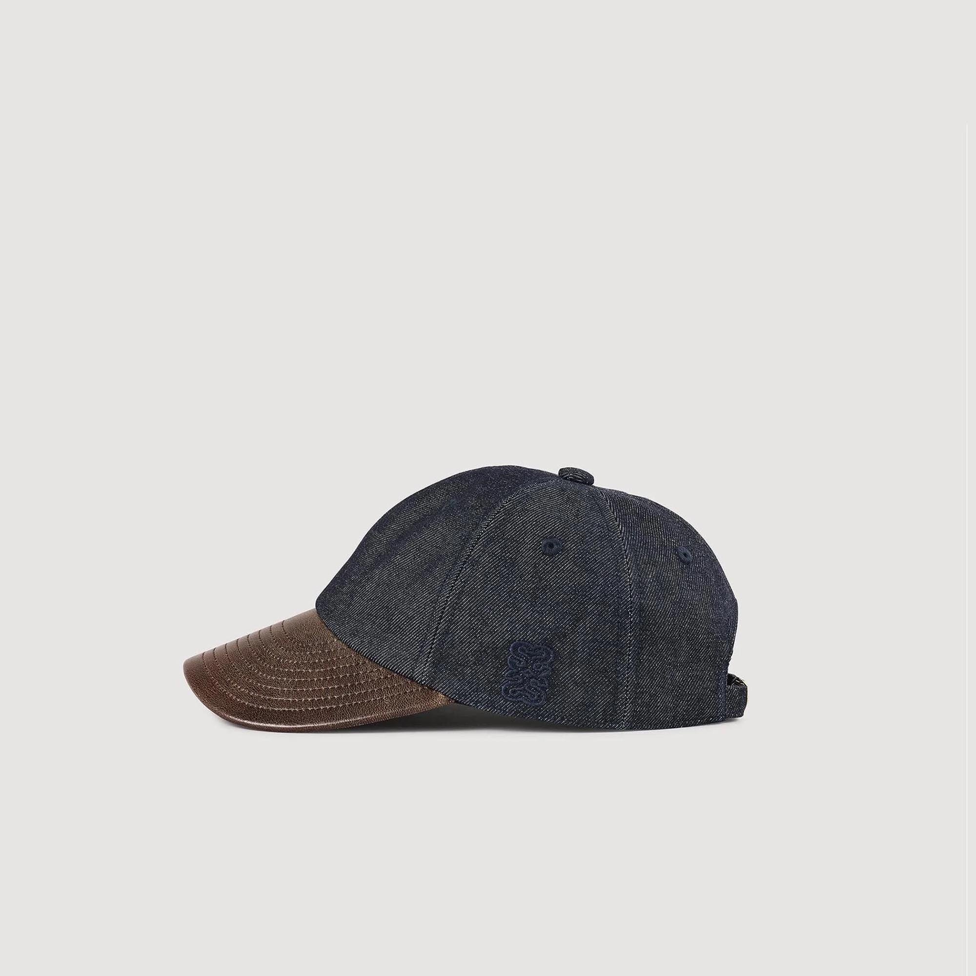 Denim and leather cap