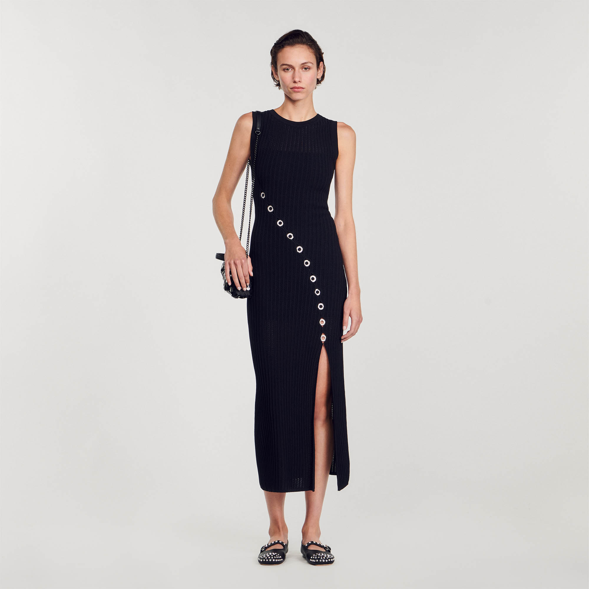 Sandro viscose Sleeveless rib knit maxi dress, with round neck, asymmetric front slit and embellished with openwork jewellery and rhinestone details