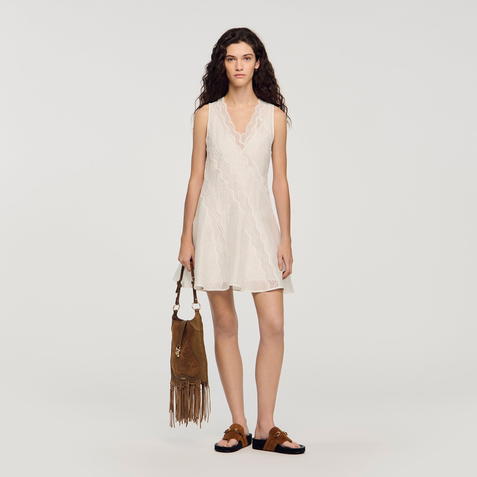 Sandro linen Mini sleeveless dress with a V-neck and flared cut, decorated with fancy trim
