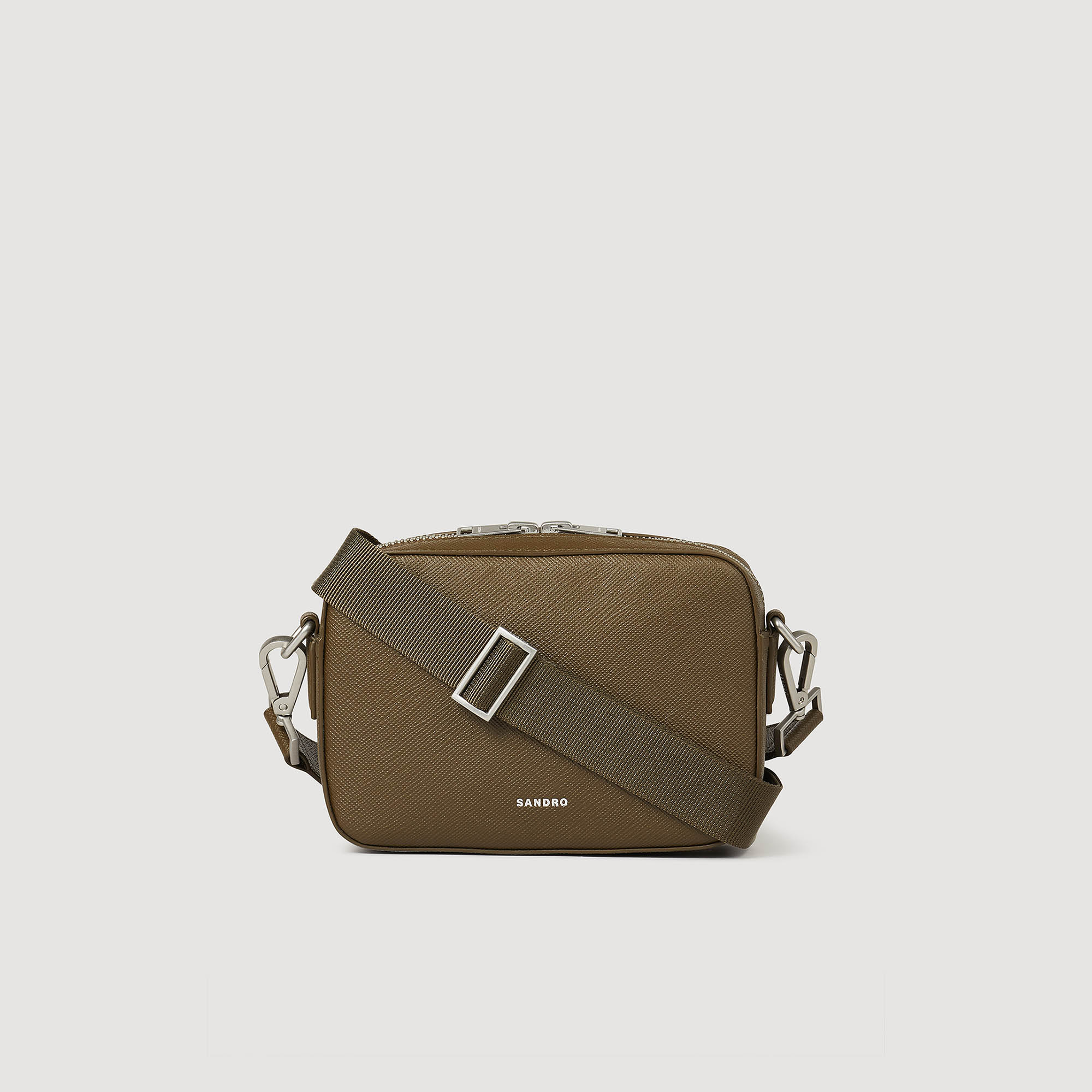 Sandro synderm Lining: Small bag in recycled saffiano leather, with a long adjustable shoulder strap in technical fabric, a lining in technical fabric, and embellished with a silver print embossed Sandro logo