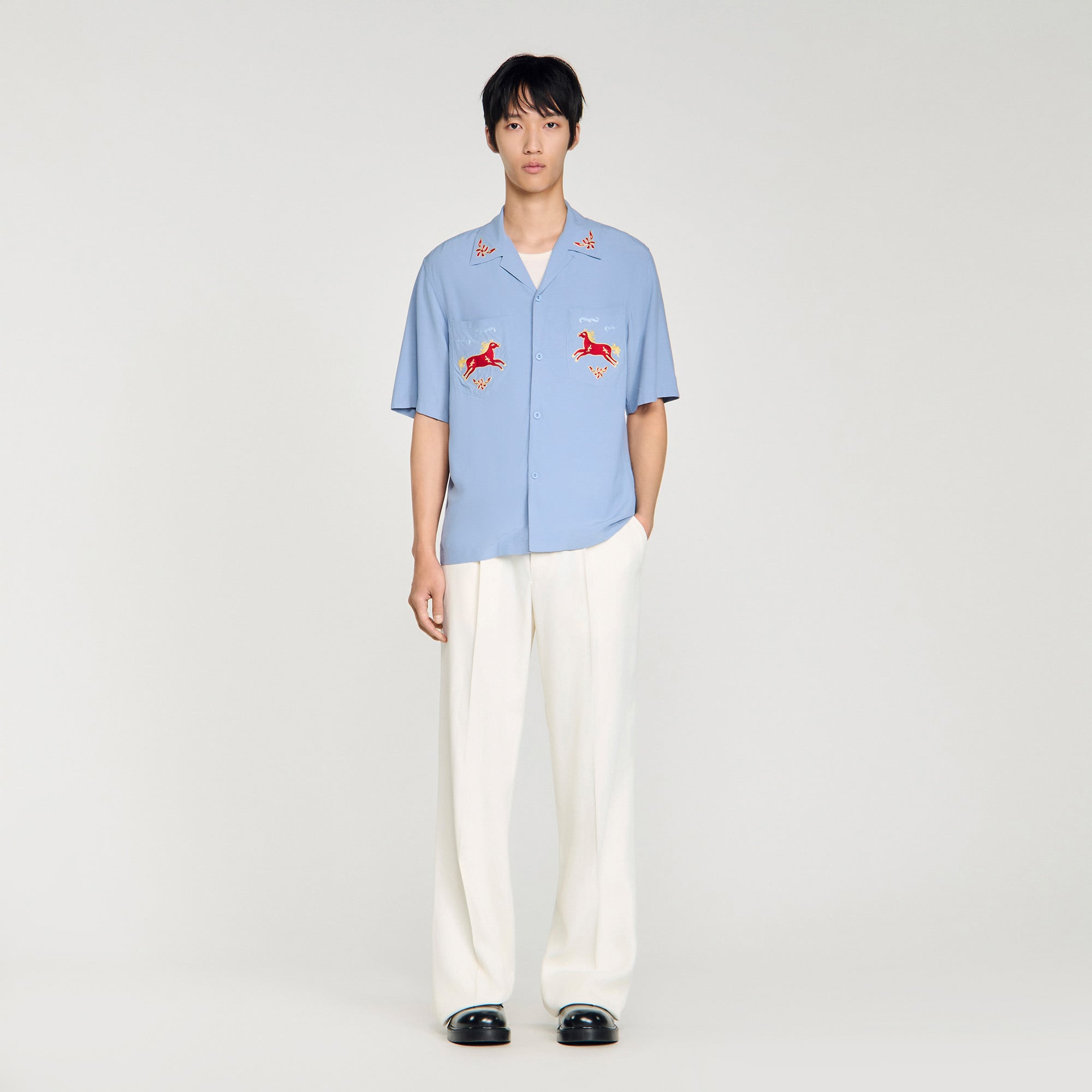 Embroidered horse loose-fit shirt in Chambray for Men | Sandro Paris