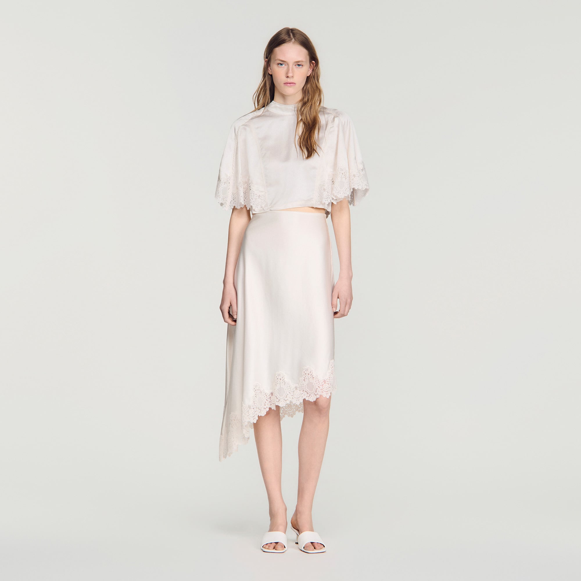 Asymmetrical satin skirt with lace