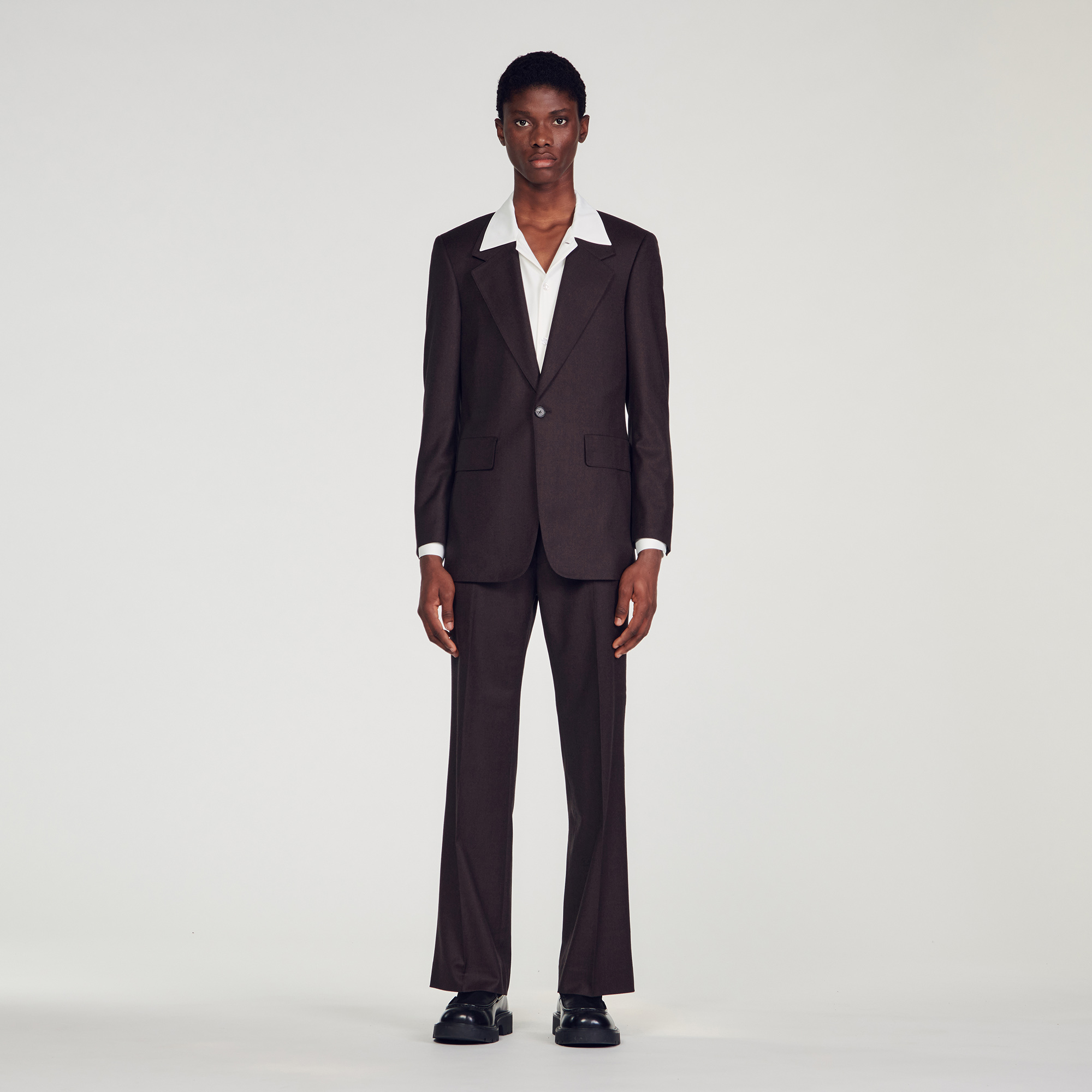 Sandro virgin wool Body lining: Oversized suit jacket featuring a wide collar, long sleeves, a two-button fastening and flap pockets