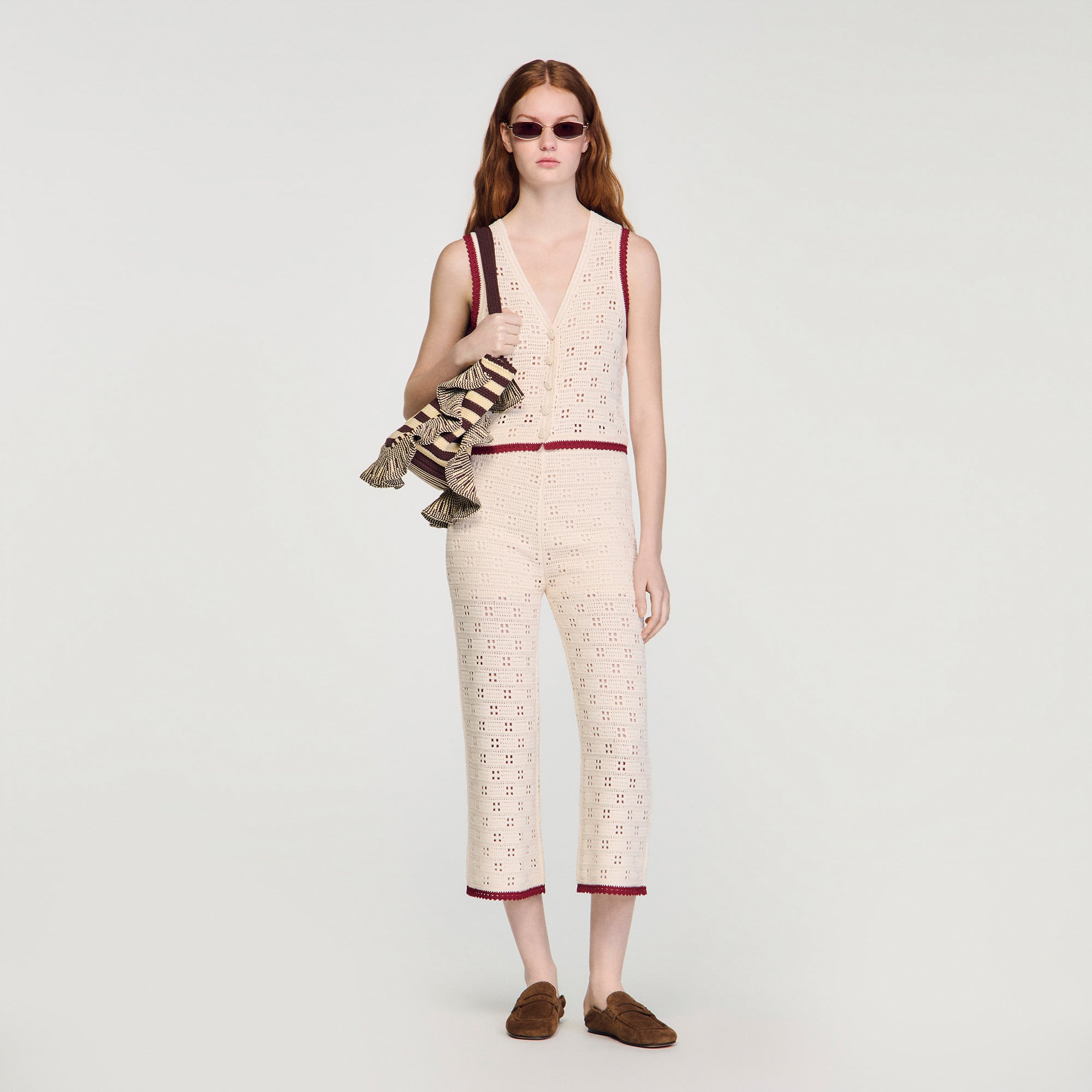 Crochet-look knit trousers