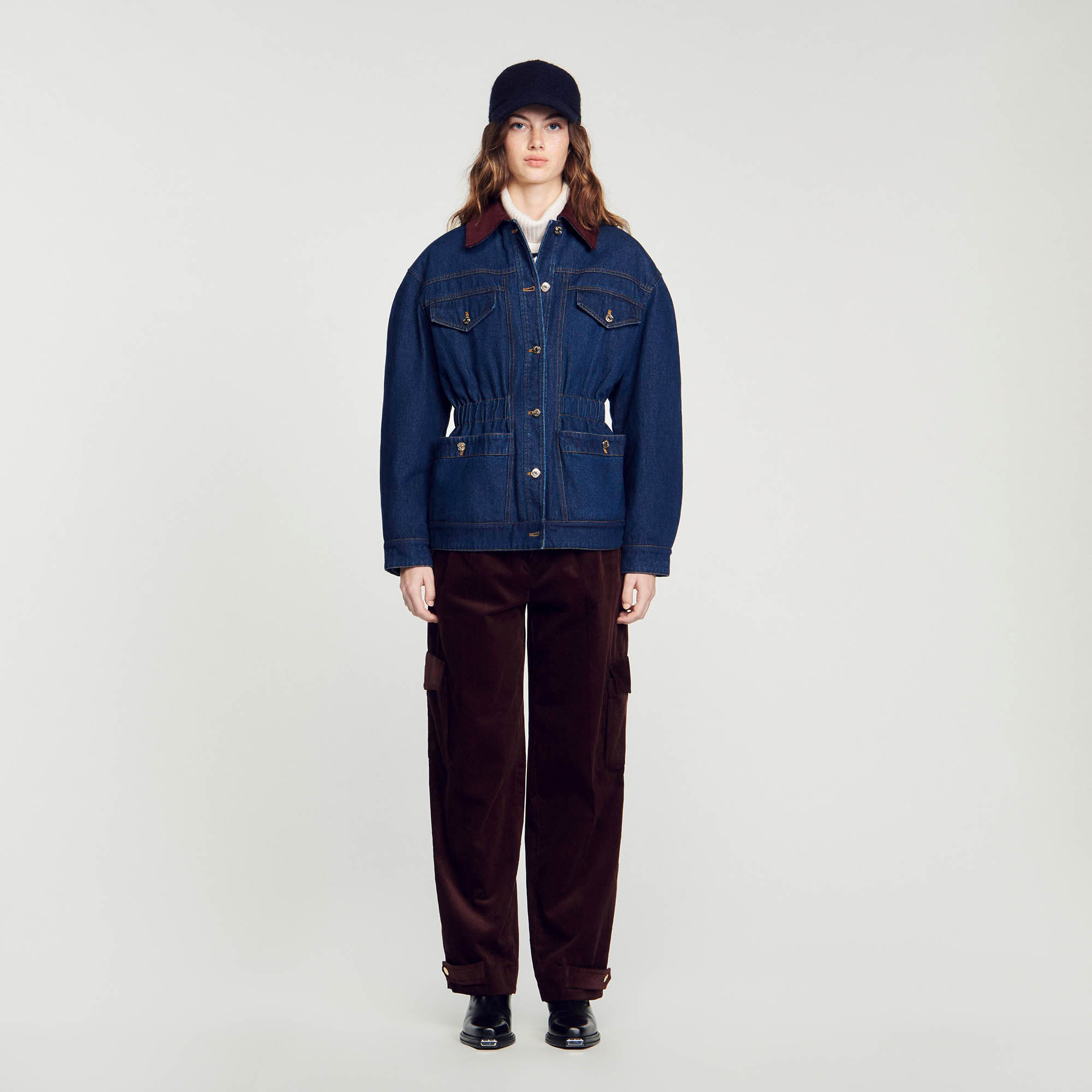Sandro cotton Lining: Reversible quilted jacket in denim on one side and patterned on the other, featuring a contrasting collar, long sleeves, an elasticated waistband and front patch and flap pockets
