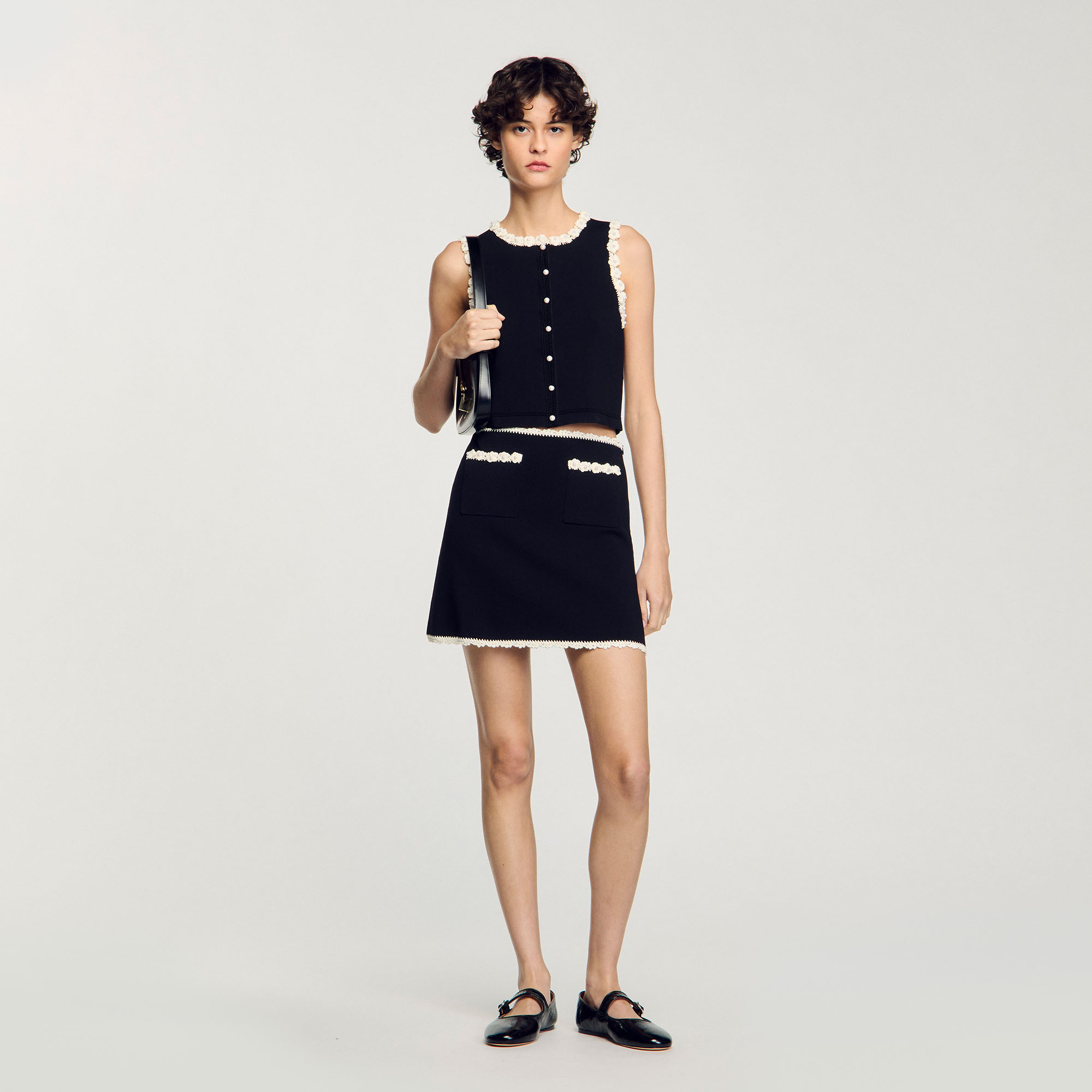 Sandro Mini skirt with crochet details