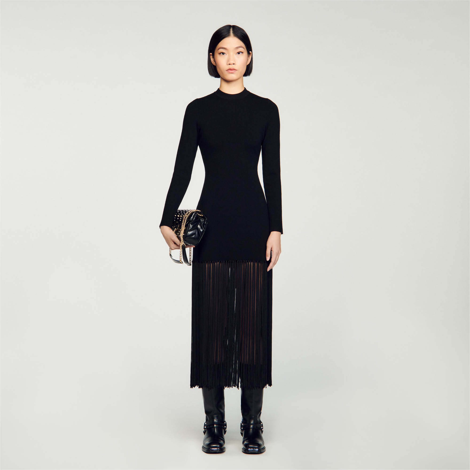 Sandro polyamide Knitted maxi dress with round neck and long sleeves, embellished with fringes at the bottom