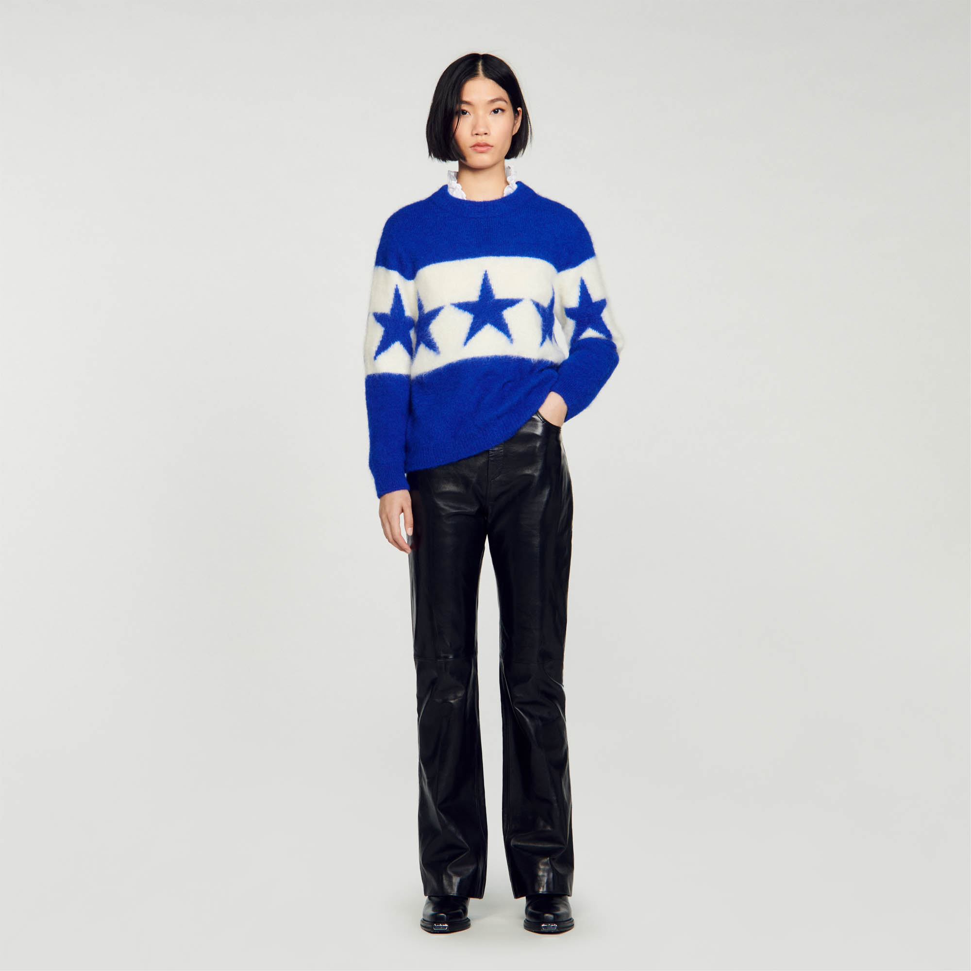 Sandro polyamide Oversized fluffy knit with round neck and long sleeves, embellished with a contrasting stripe with star motifs