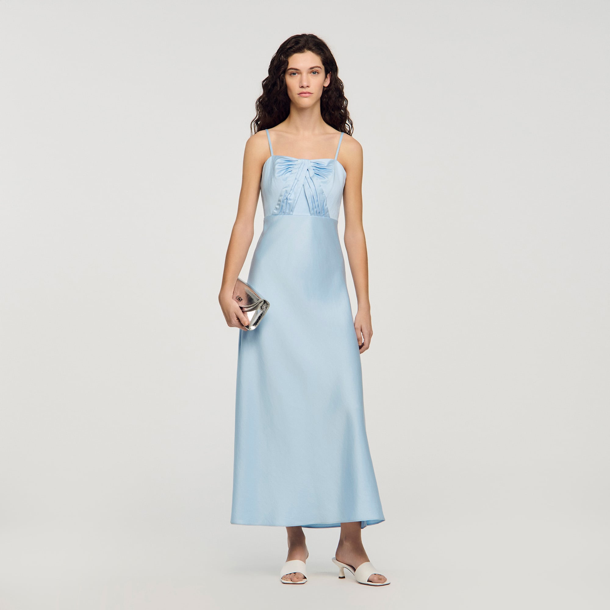 Sandro lyocell Satin-effect maxi dress with straps and a pleated bustier top, featuring a fitted cut and a flowy, flared skirt
