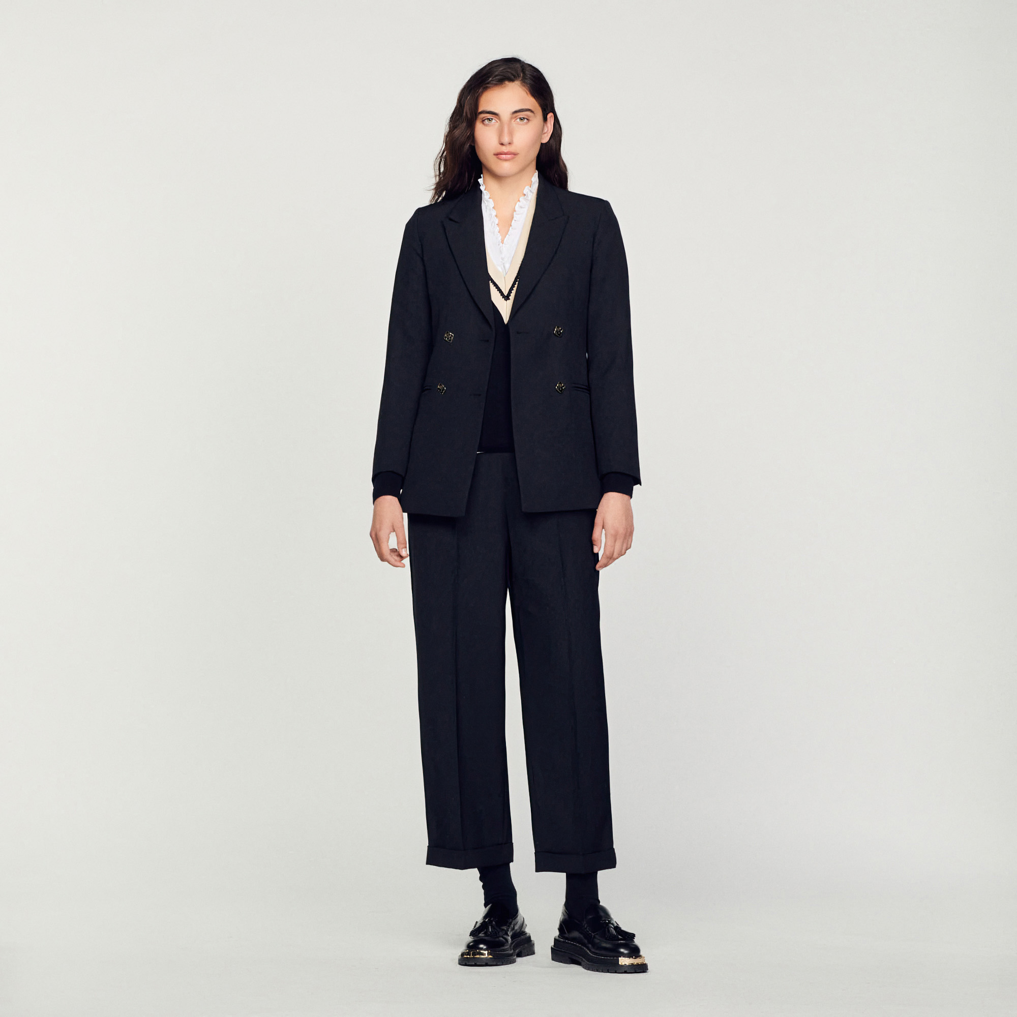 Sandro polyester Sandro women's blazer â€¢ Tailored jacket â€¢ Tailored collar â€¢ Long sleeves â€¢ Piped pockets â€¢ Double-breasted button fastening â€¢ This blazer matches the pants The model is 178 cm / 5'10 tall and wears a size 36 FR / 8 UK This item's main material is at least 50% recycled